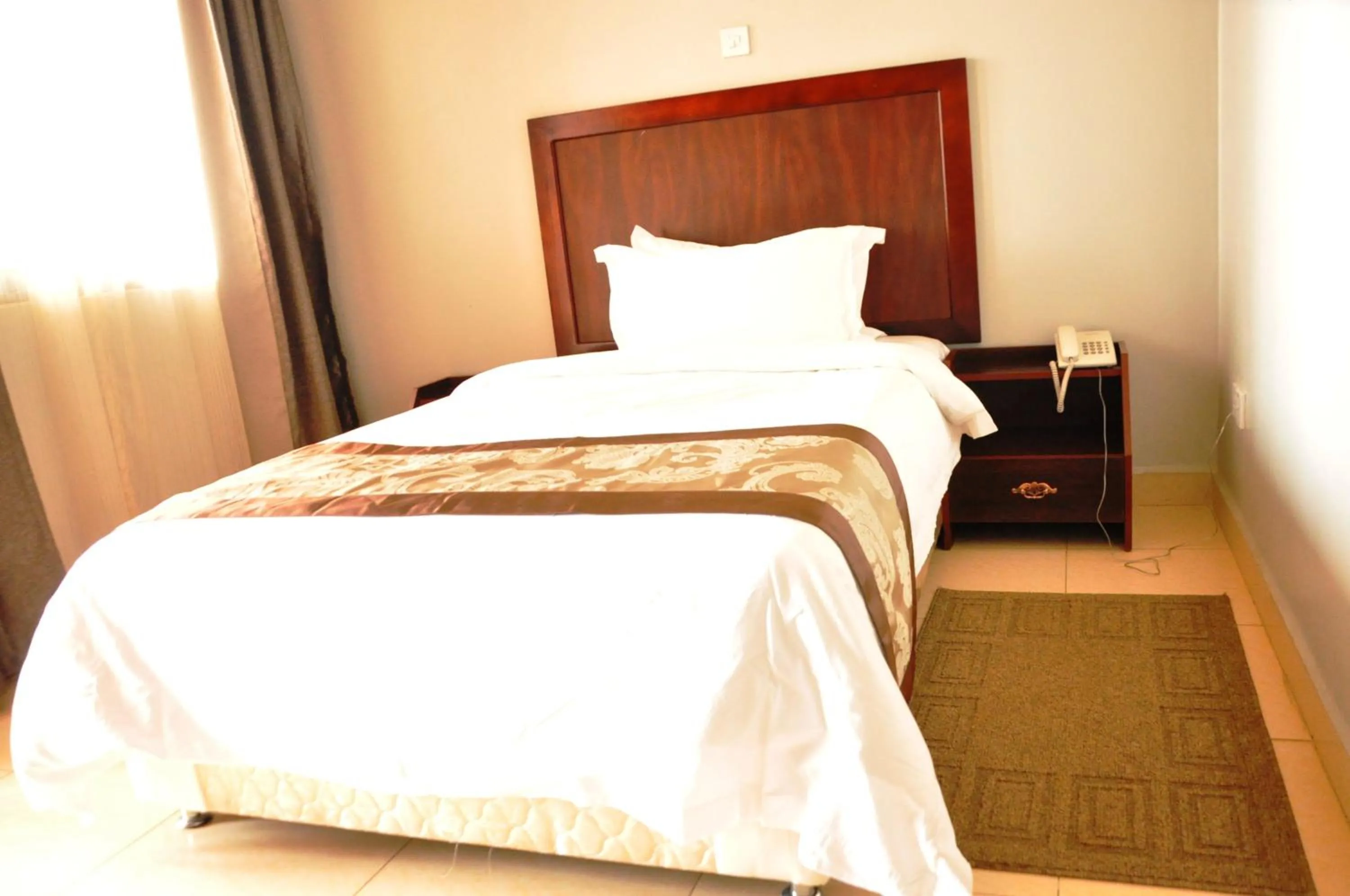 Bed in Easy View Hotel Mbarara