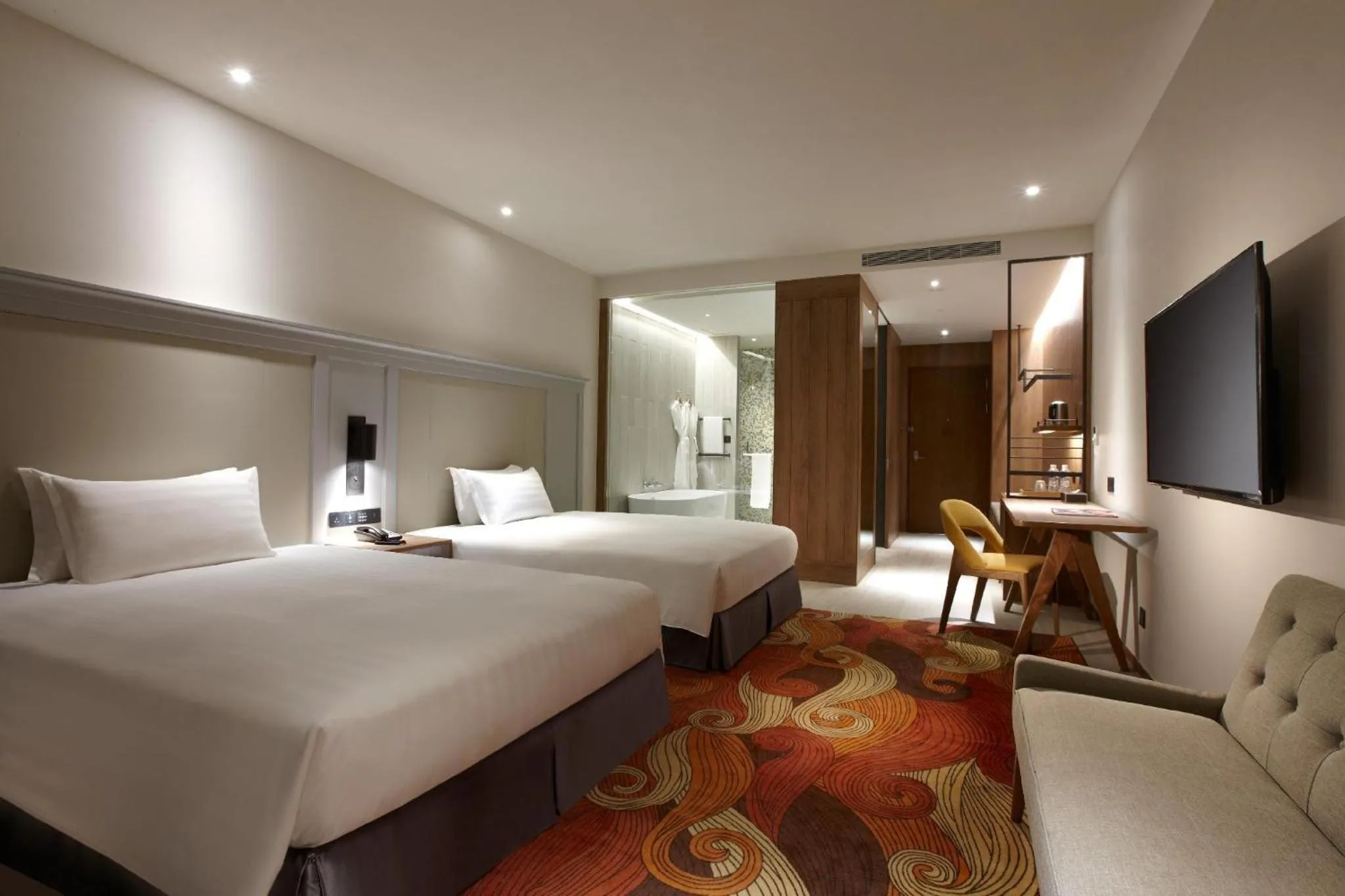 Bed in Discovery Hotel