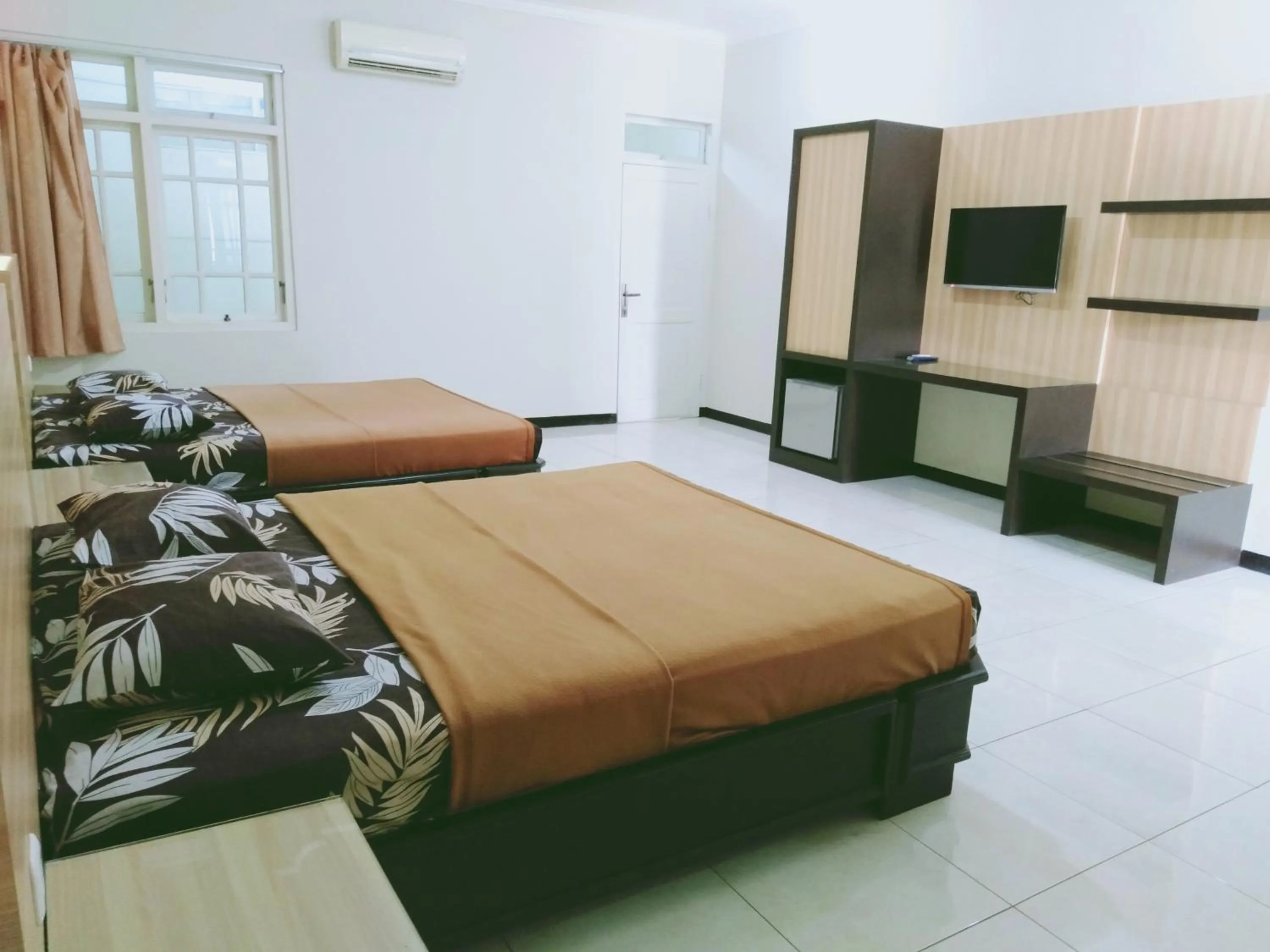 Photo of the whole room, Bed in Hotel Taman Indah