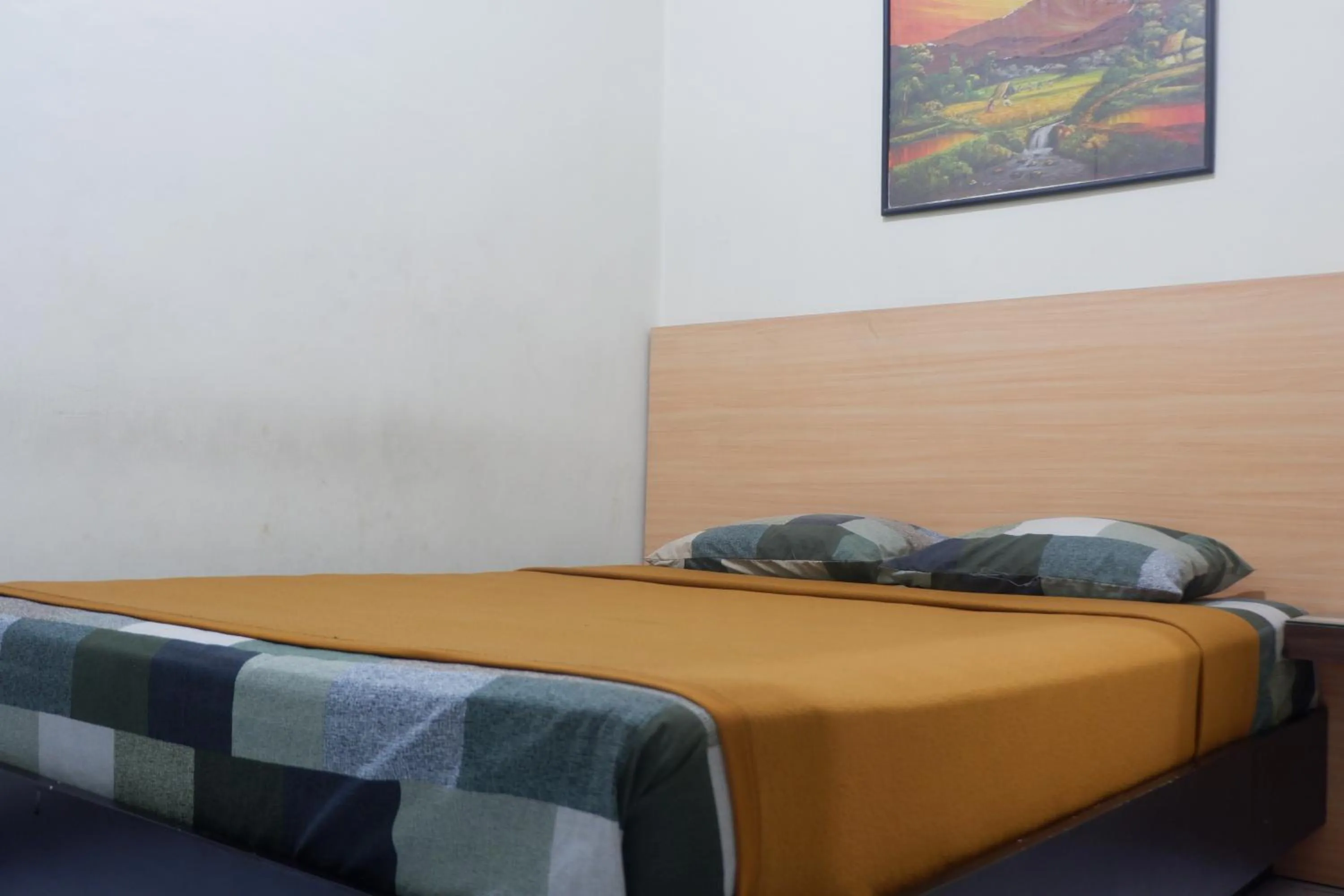 Bed in Hotel Taman Indah