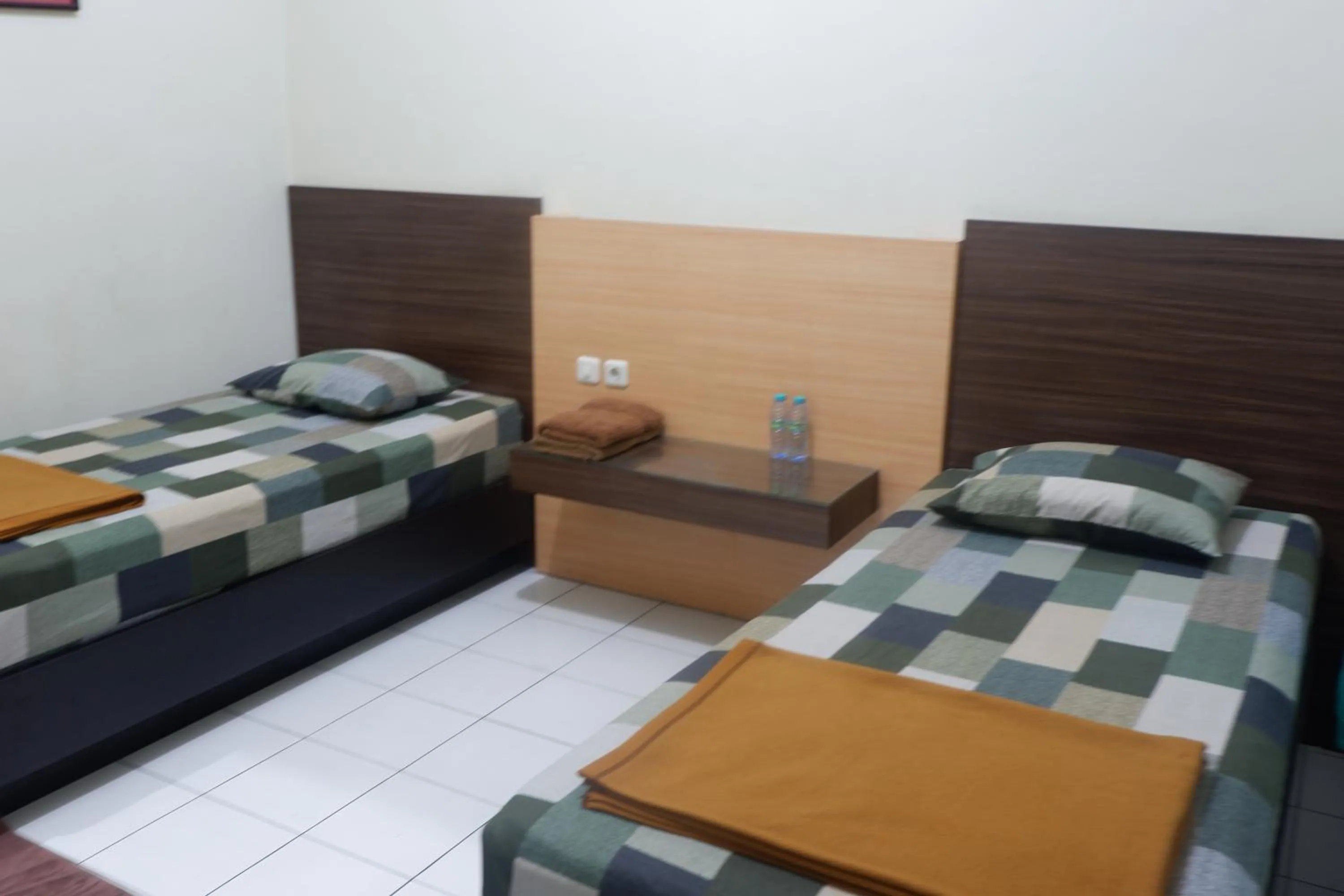 Landmark view, Bed in Hotel Taman Indah