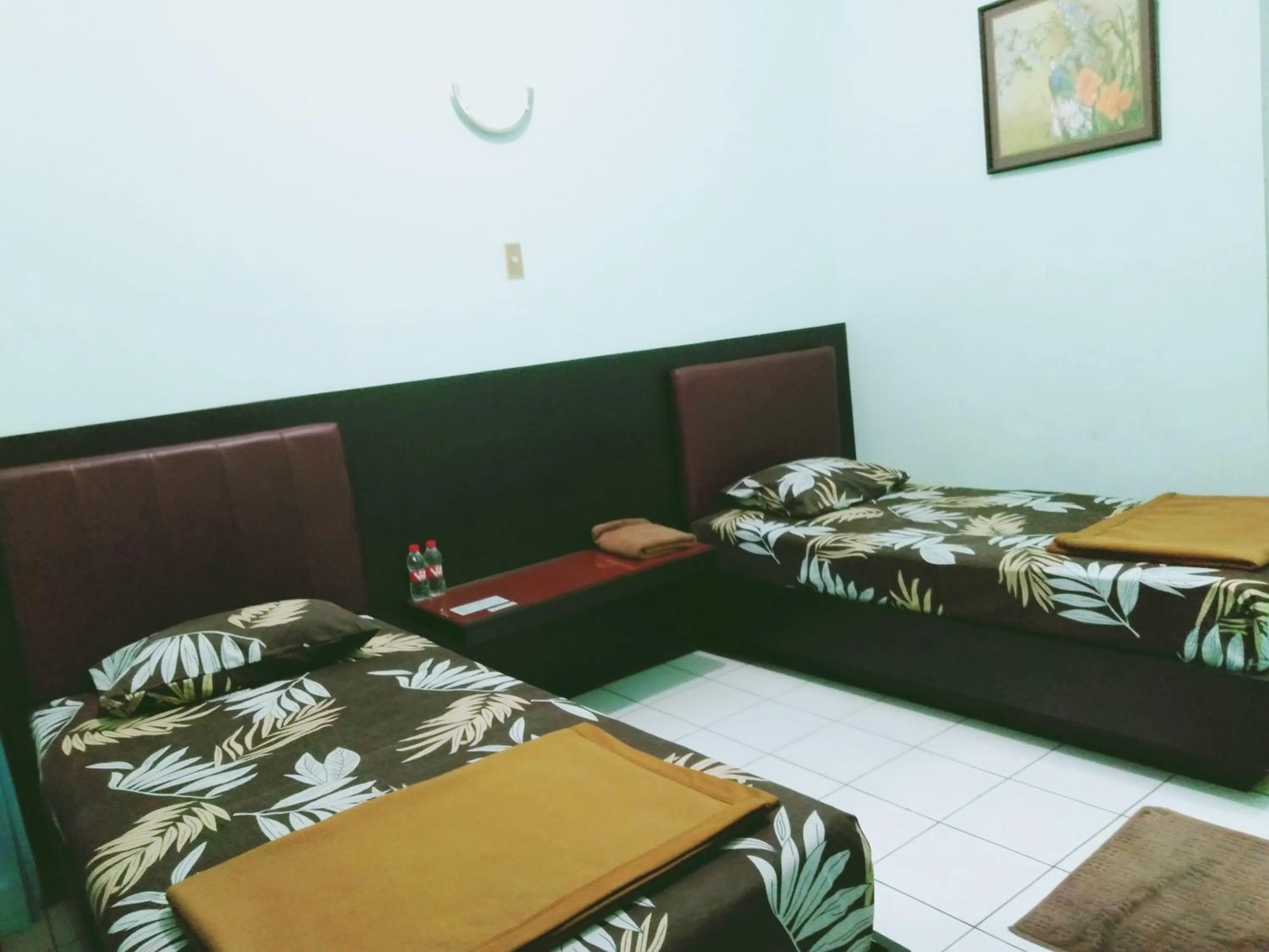 Bed in Hotel Taman Indah