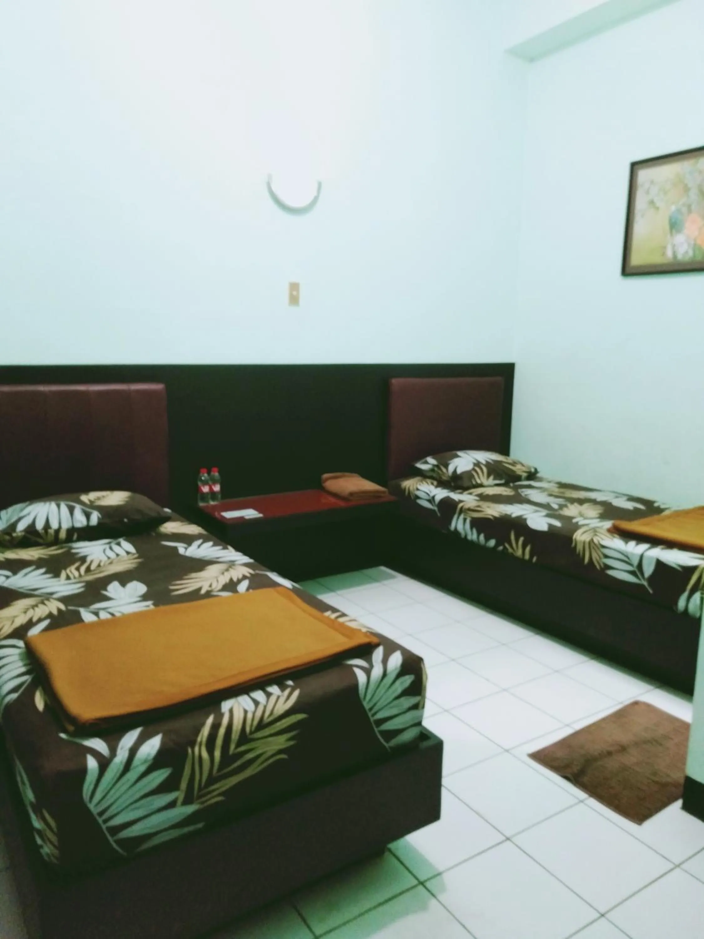 Bed in Hotel Taman Indah