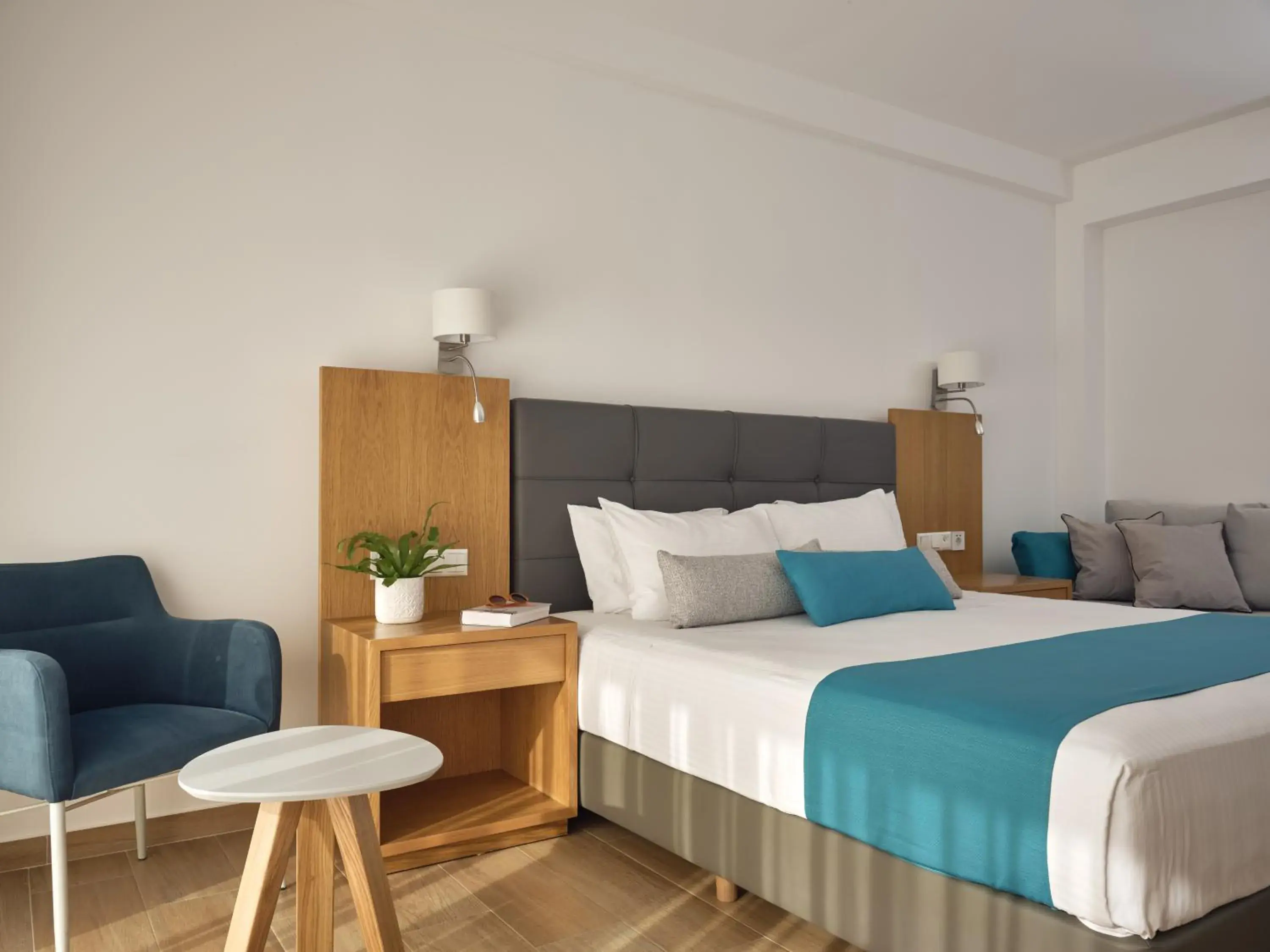 Bedroom, Bed in Cavo Orient Beach Hotel & Suites Bedroom, Bed in Cavo Orient Beach Hotel & Suites