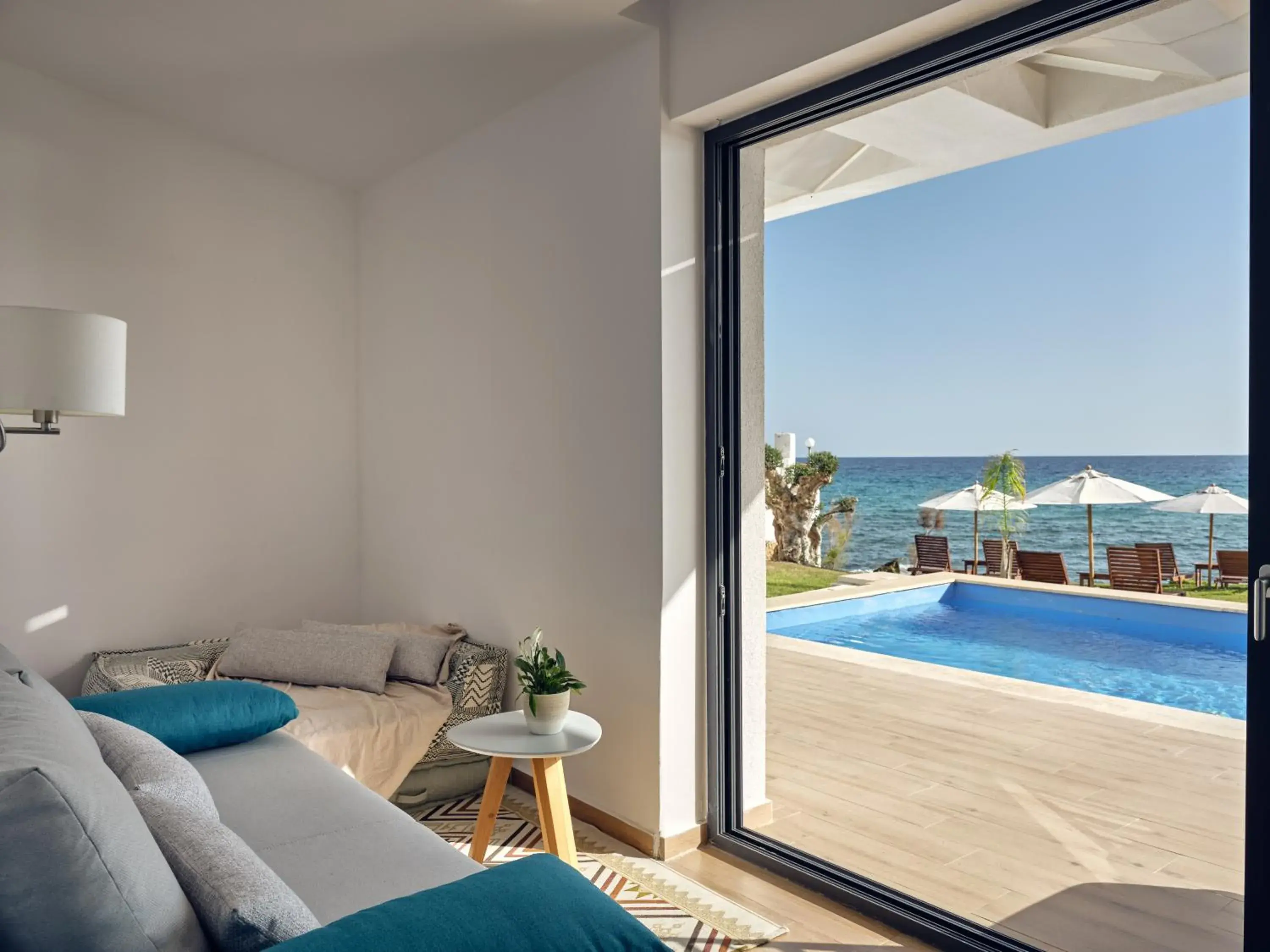 Pool view in Cavo Orient Beach Hotel & Suites Pool view in Cavo Orient Beach Hotel & Suites