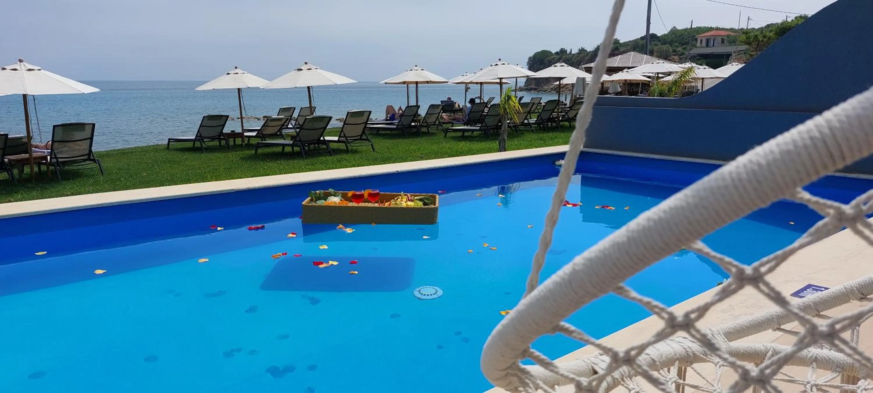 Pool view in Cavo Orient Beach Hotel & Suites