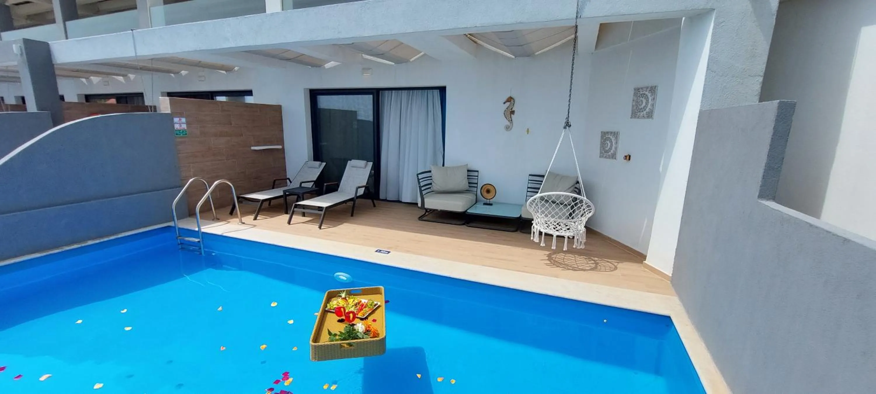 Swimming pool in Cavo Orient Beach Hotel & Suites