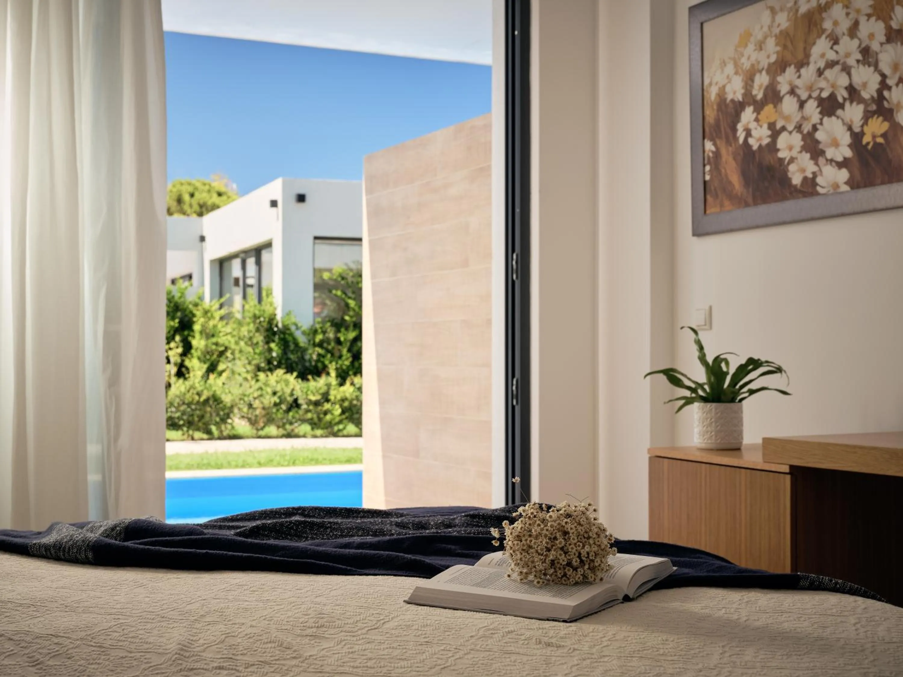 Bedroom in Cavo Orient Beach Hotel & Suites