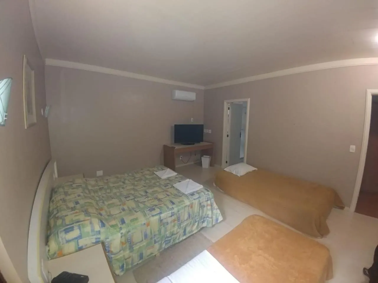 Bed in Pousada Gardenia Guest House