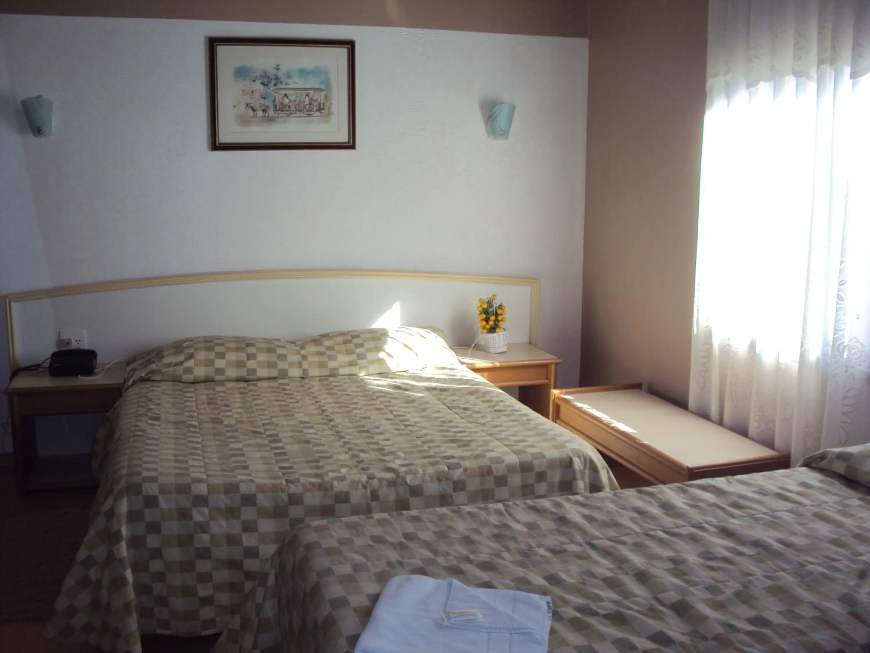 Bed in Pousada Gardenia Guest House