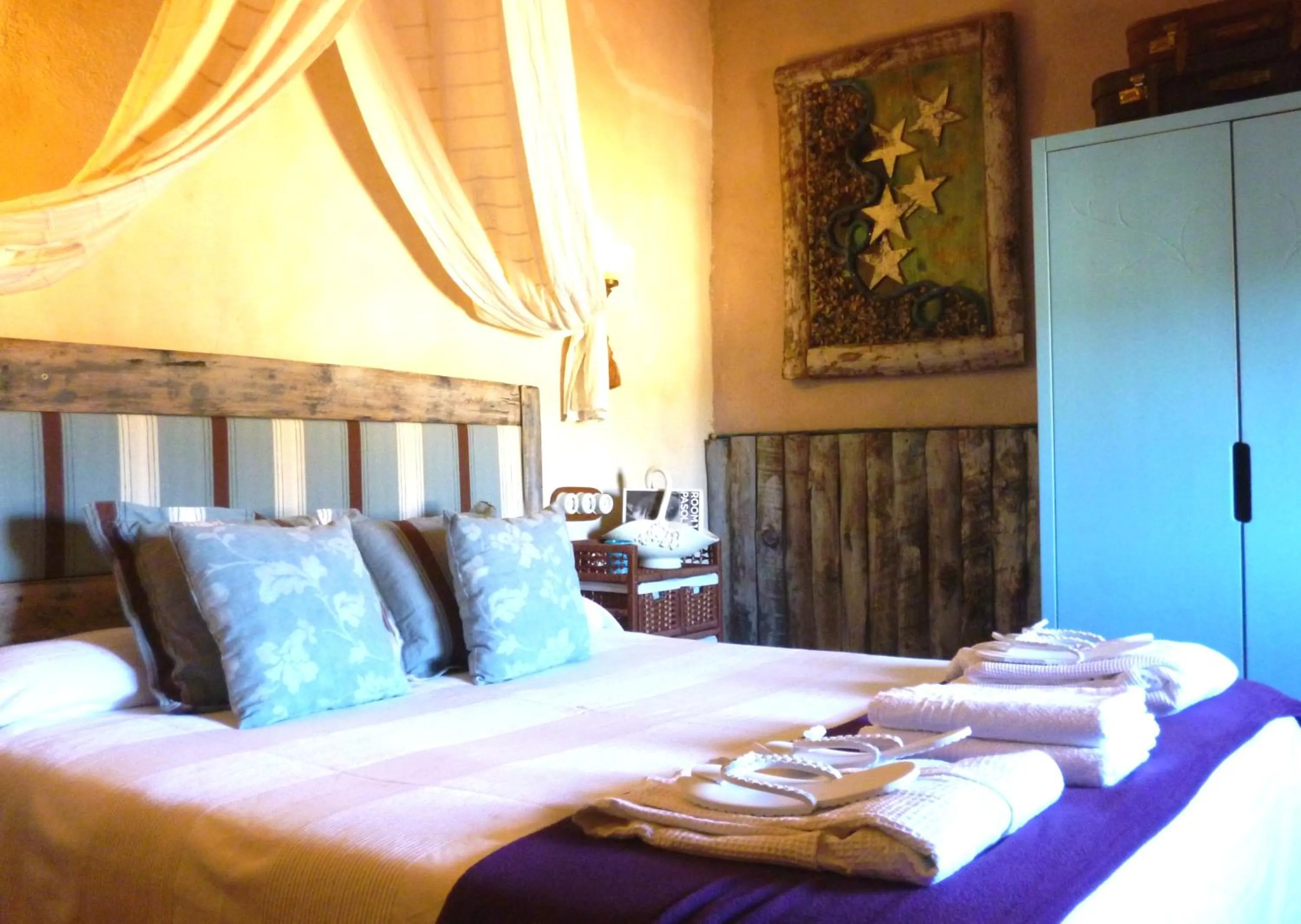 Bed in Les Vinyes Alojamiento Rural Boutique & SPA