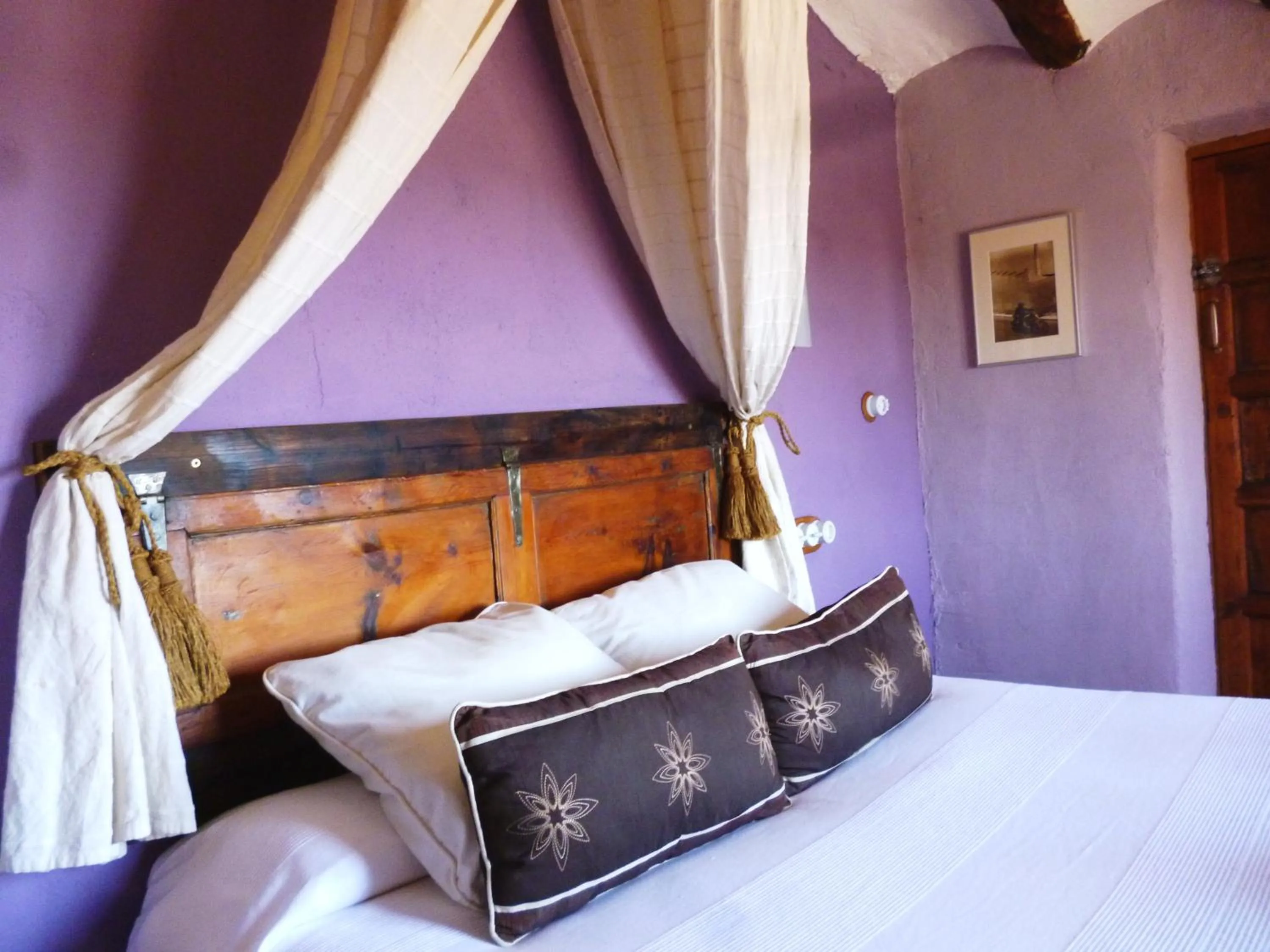 Bed in Les Vinyes Alojamiento Rural Boutique & SPA