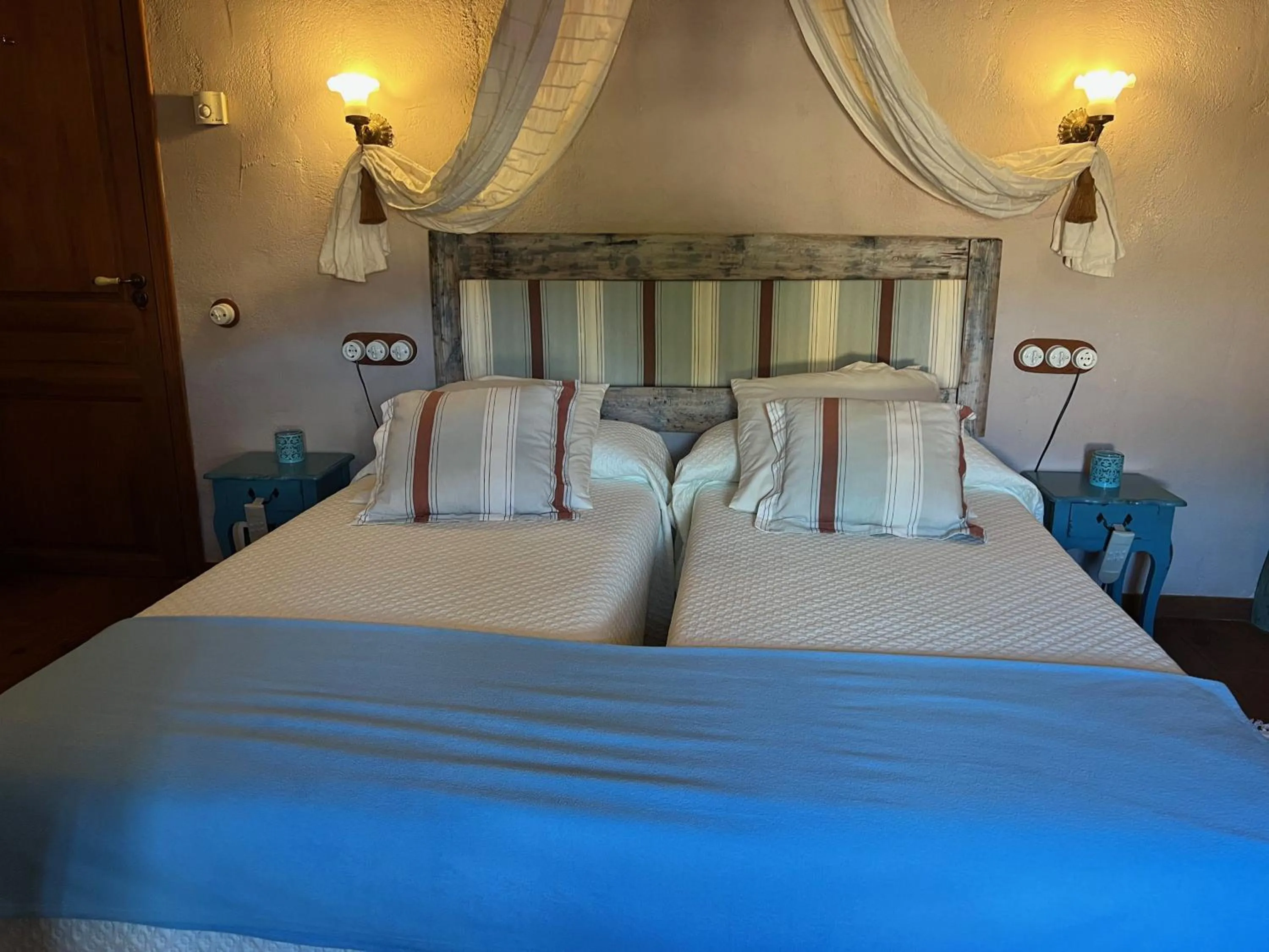 Bed in Les Vinyes Alojamiento Rural Boutique & SPA