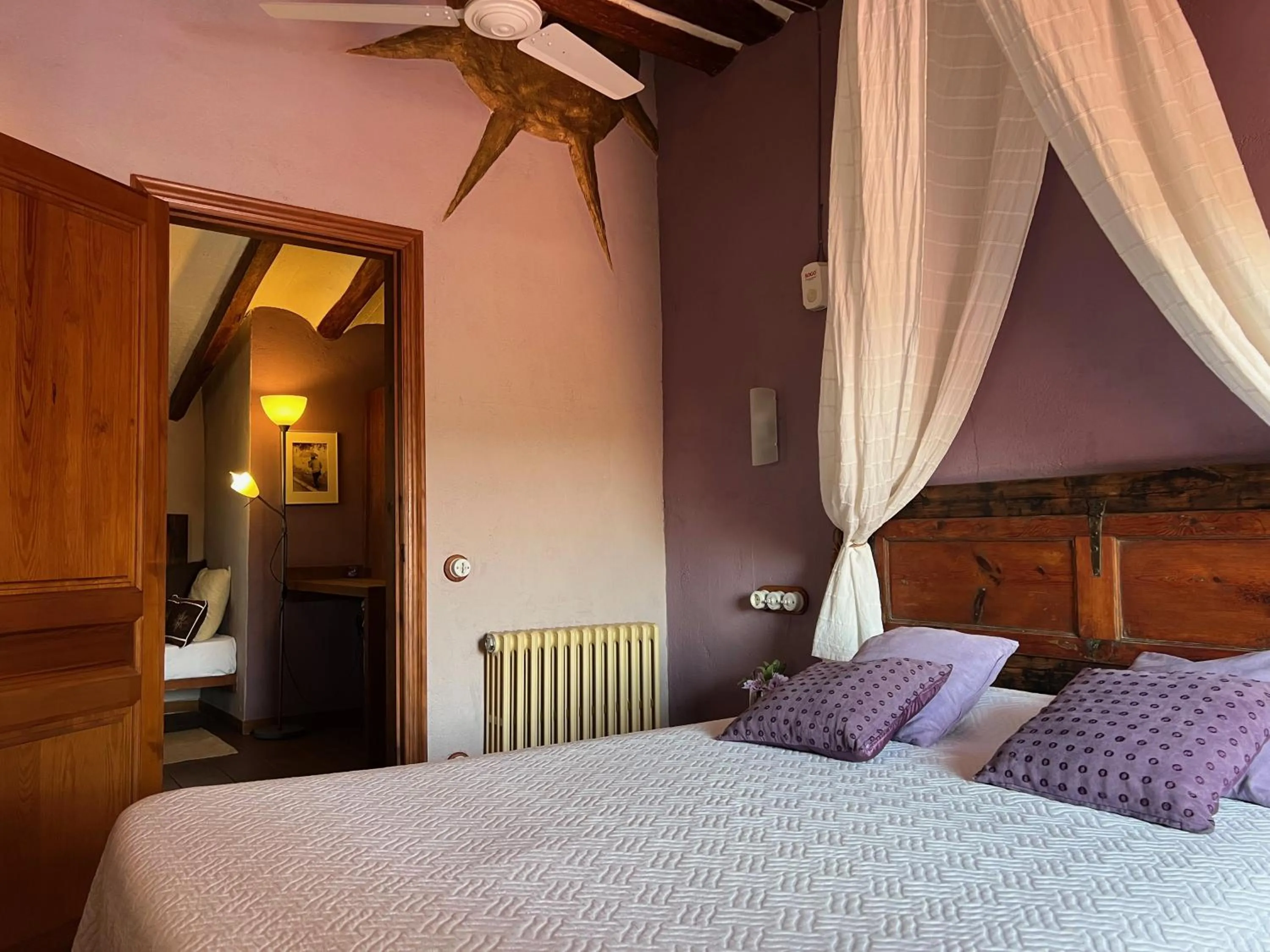 Bed in Les Vinyes Alojamiento Rural Boutique & SPA