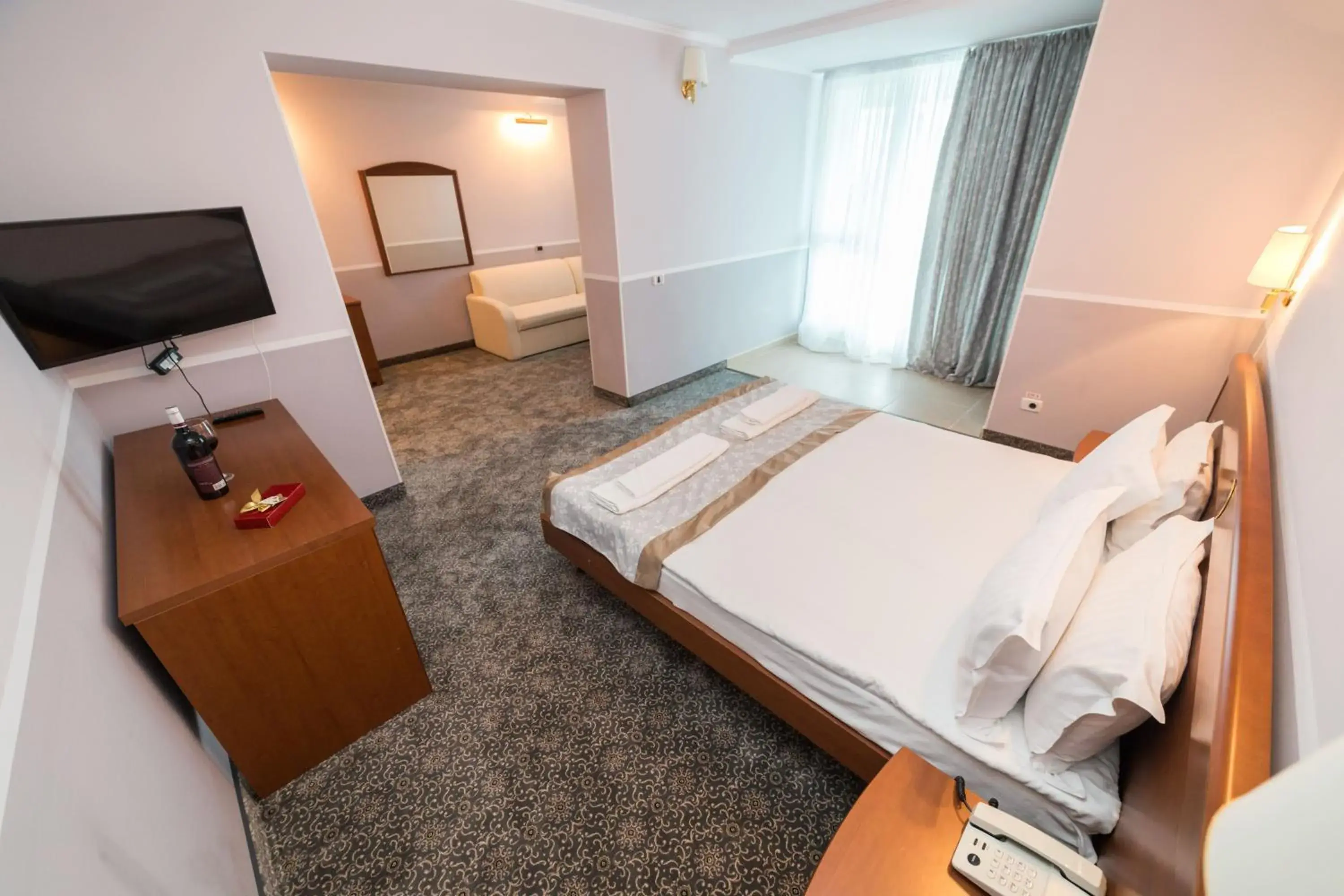 Living room, Bed in Bavaria Blu Hotel and Conference Centre Living room, Bed in Bavaria Blu Hotel and Conference Centre