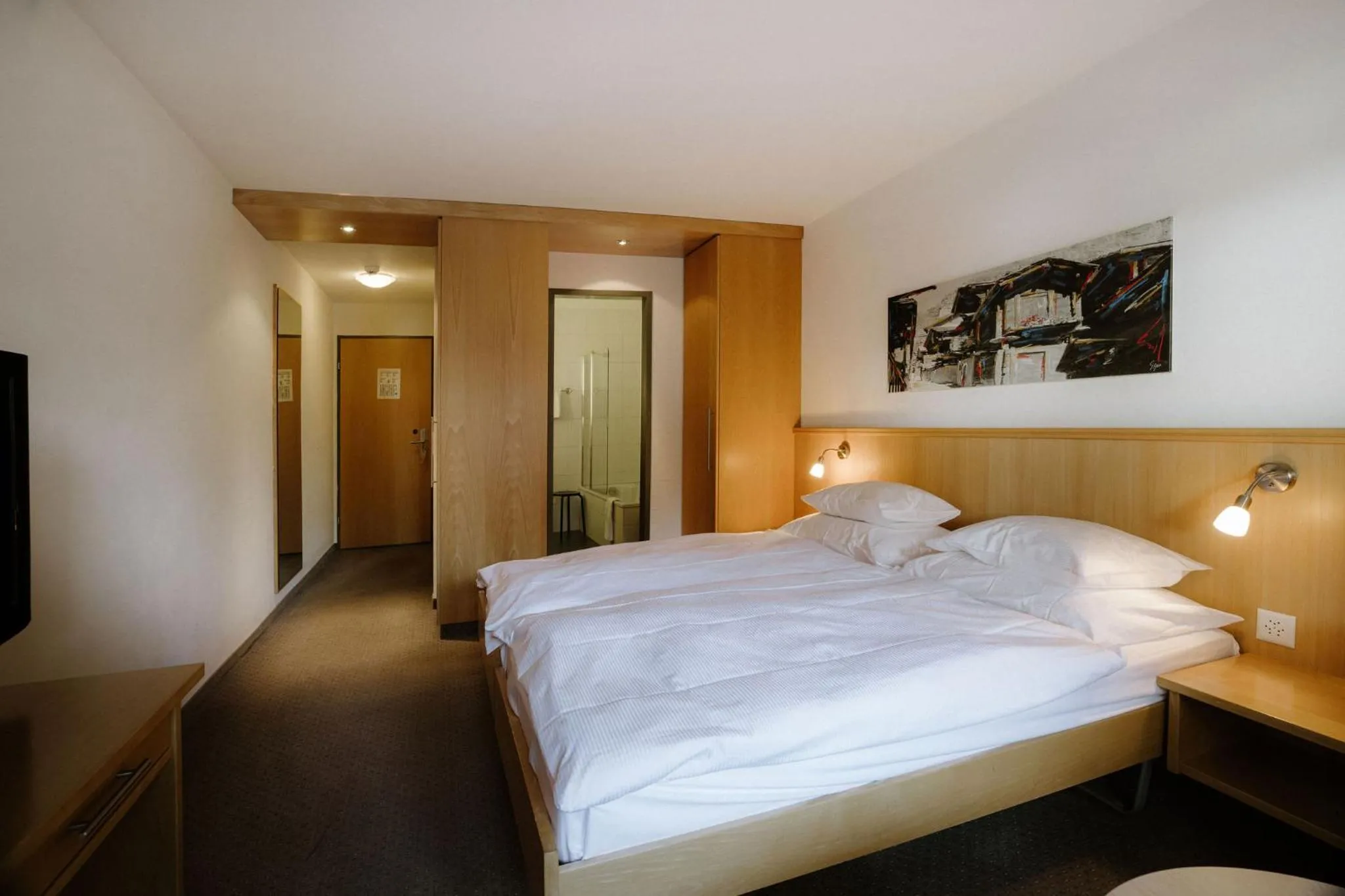 Bed in Alpine Hotel Perren