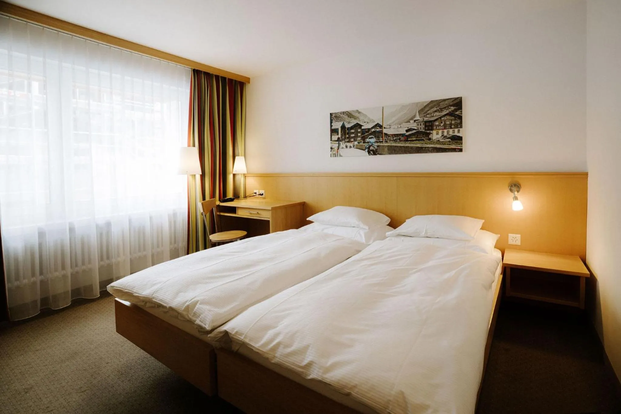 Bed in Alpine Hotel Perren