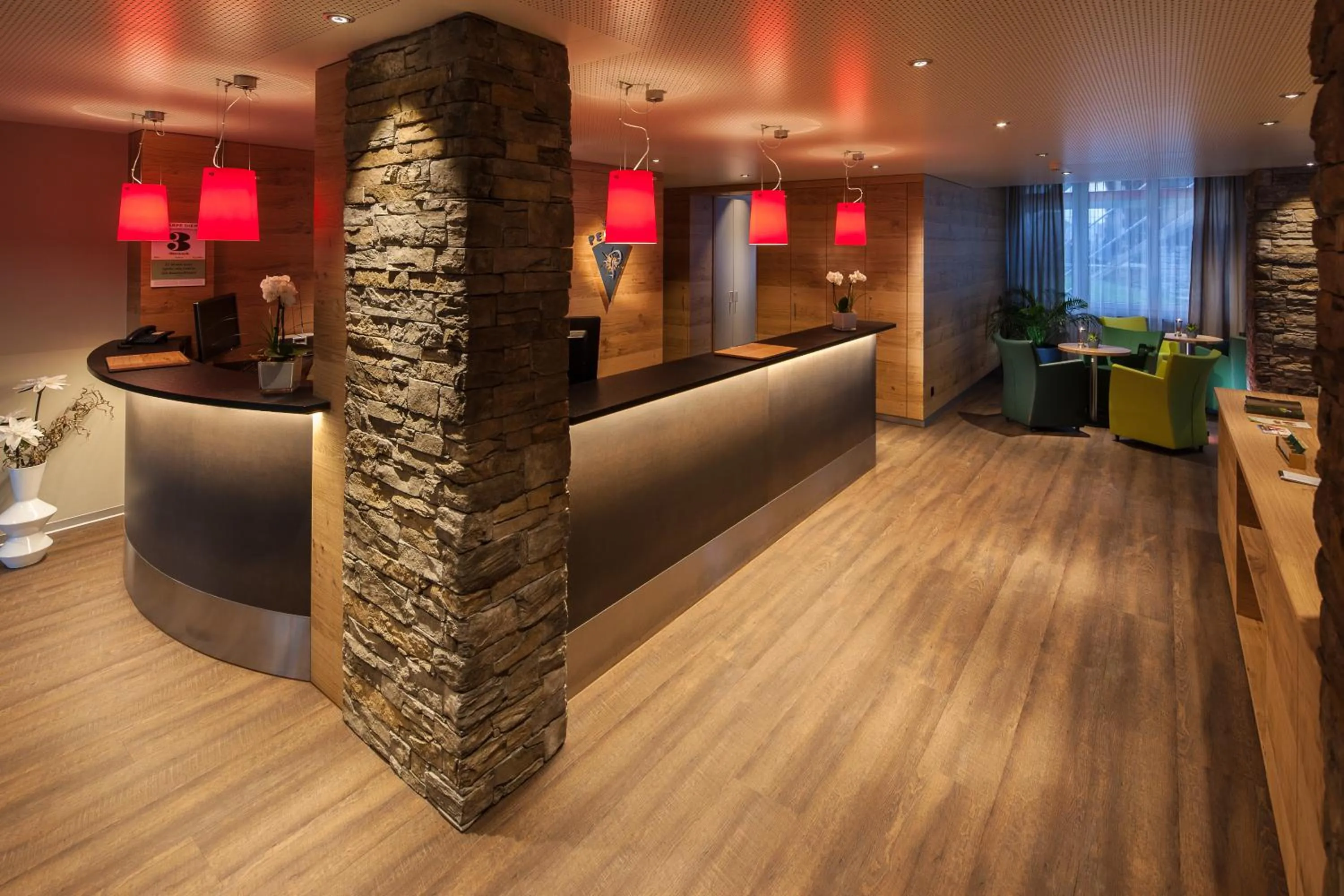 Lobby or reception in Alpine Hotel Perren