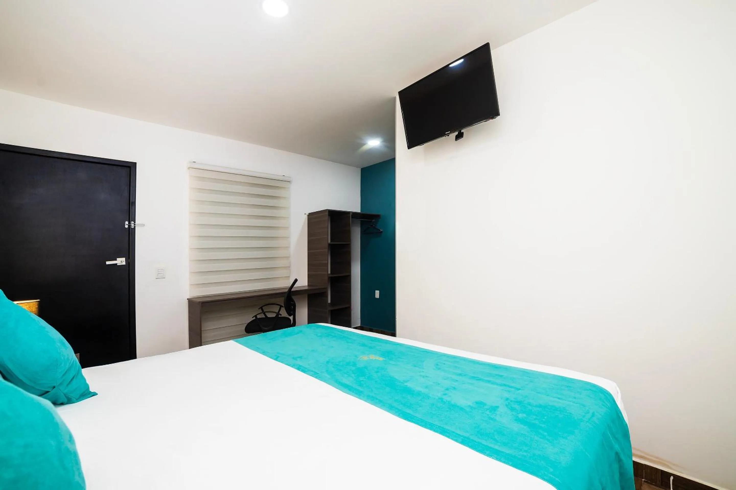 Bedroom in OYO Hotel Boutique Las Campanas