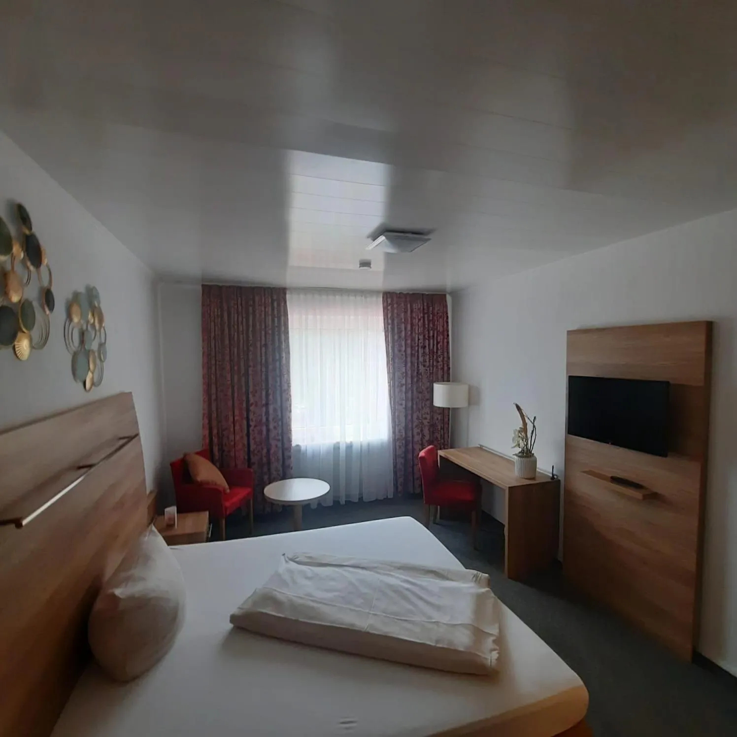 Communal lounge/ TV room, Bed in Eventhaus Schamin