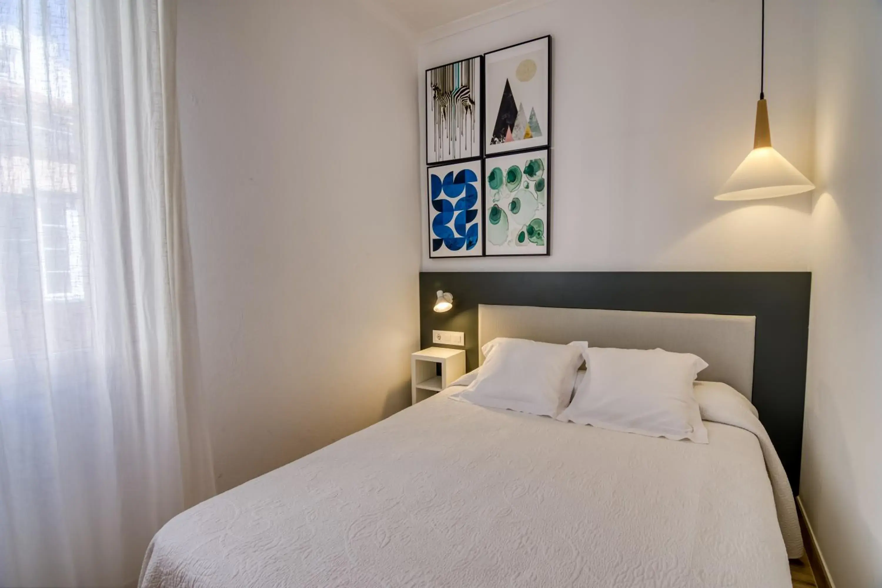 Bedroom, Bed in Hostal La Isla Bedroom, Bed in Hostal La Isla