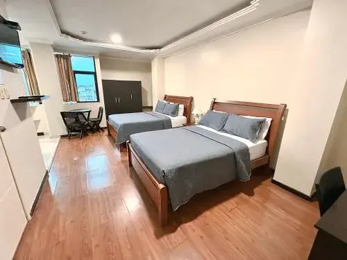 Deluxe Double Room (2 Adults + 1 Child) in Suitesecu Rentals Guayaquil Deluxe Double Room (2 Adults + 1 Child) in Suitesecu Rentals Guayaquil