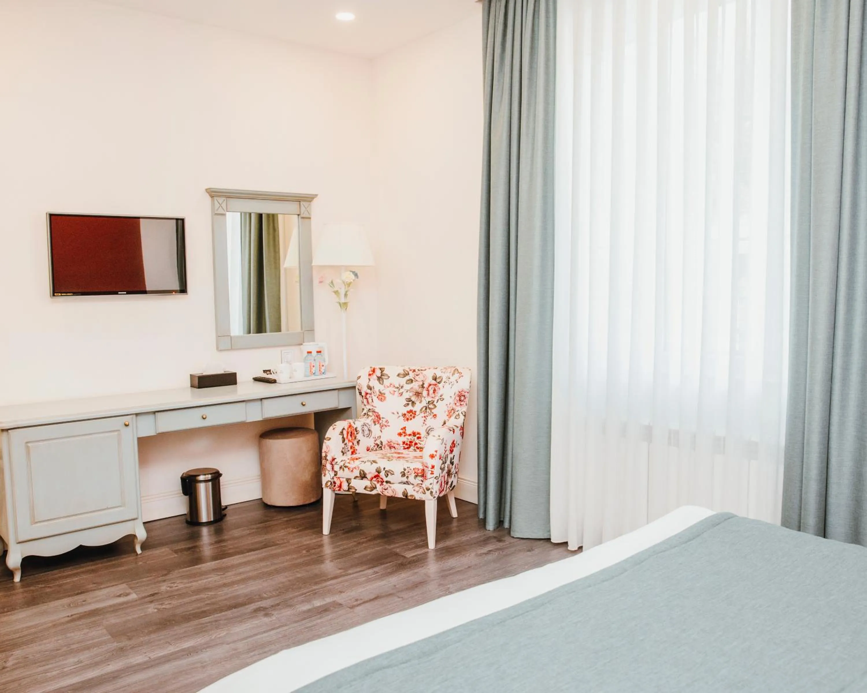 Seating area, Bed in Macara Village Resort