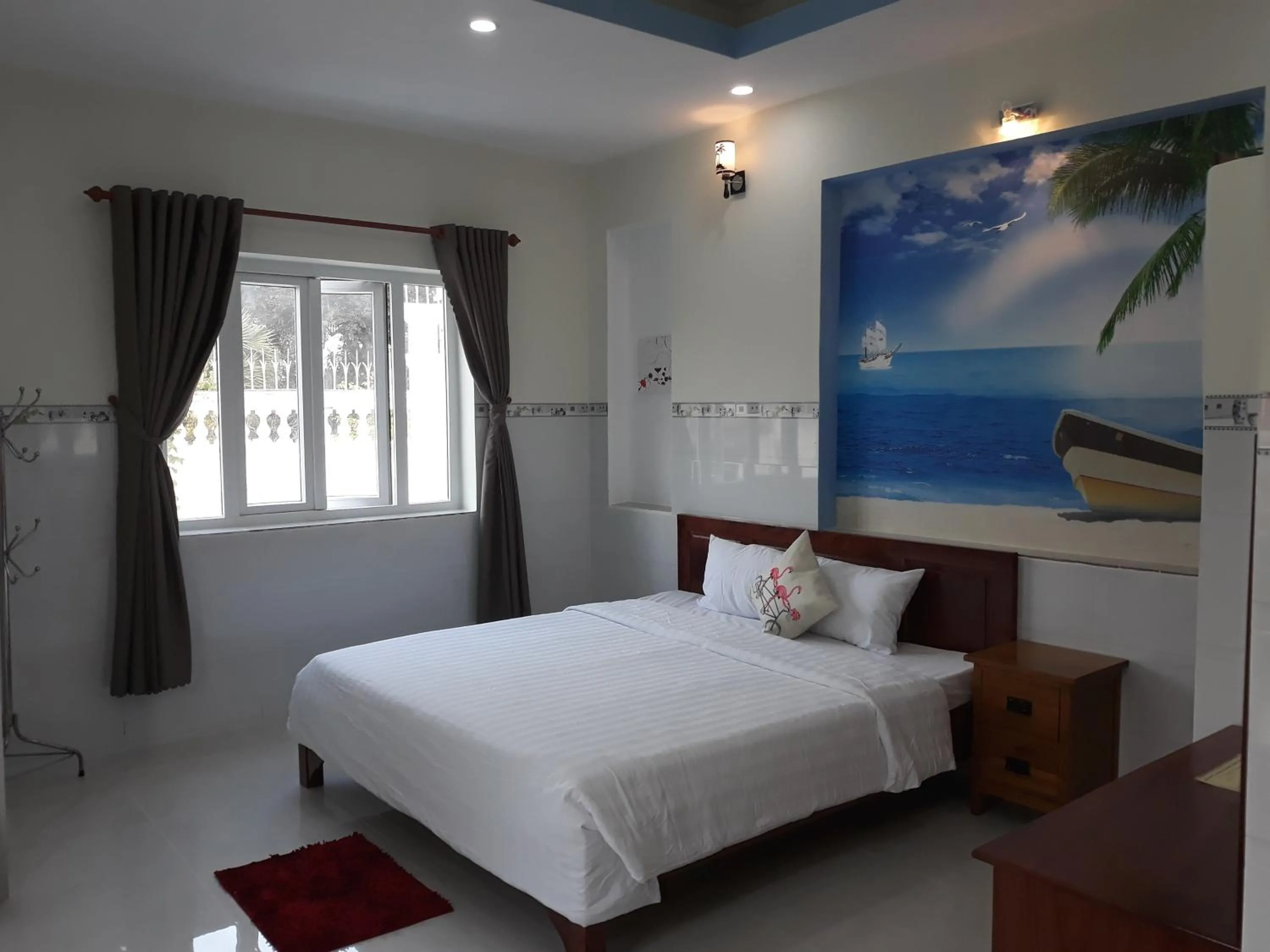 Photo of the whole room, Bed in Queen Motel Vung Tau