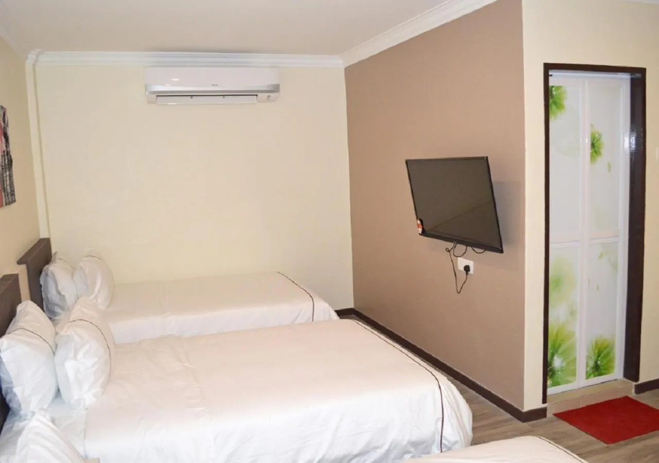 Bed in Angsoka Hotel