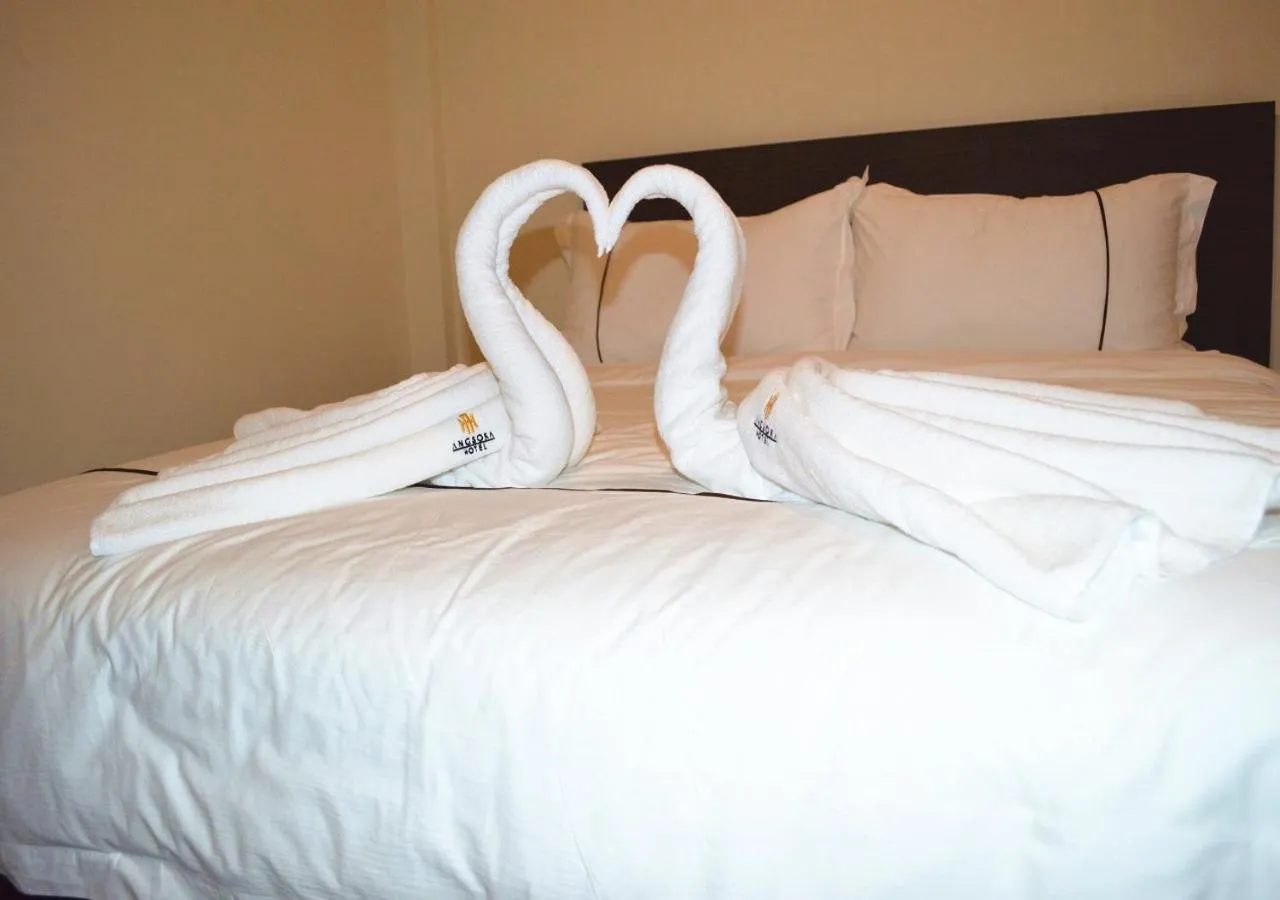 Bed in Angsoka Hotel