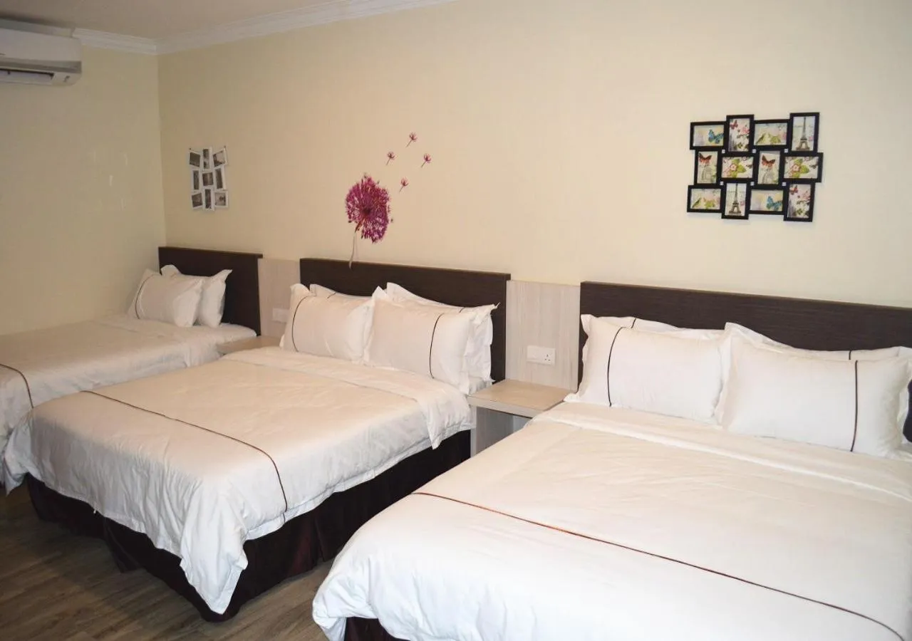 Bed in Angsoka Hotel