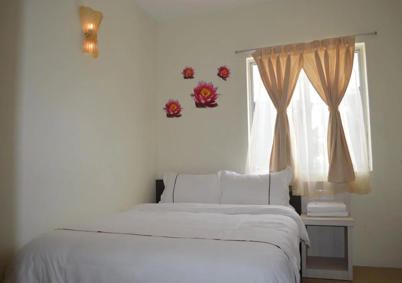 Bed in Angsoka Hotel