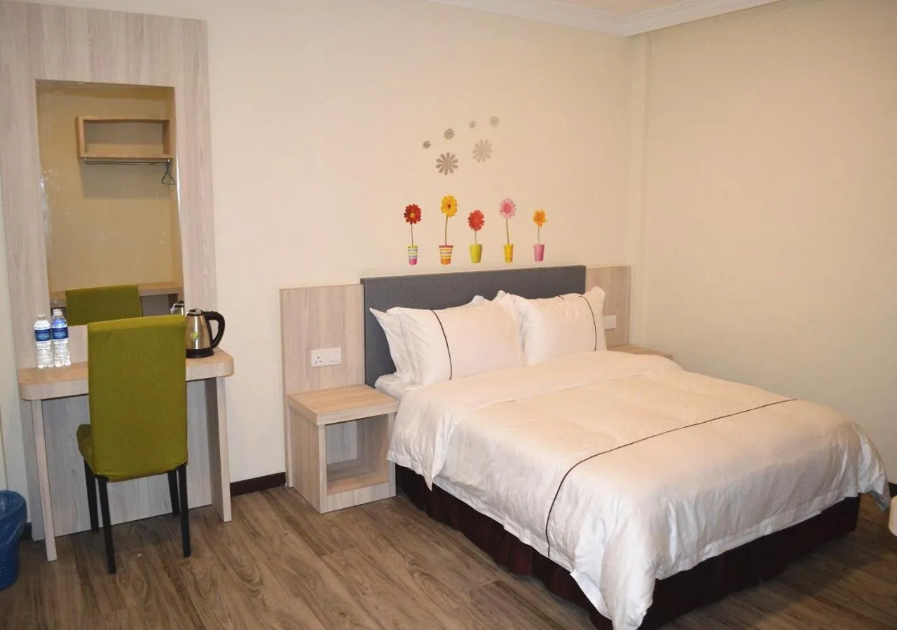 Bed in Angsoka Hotel