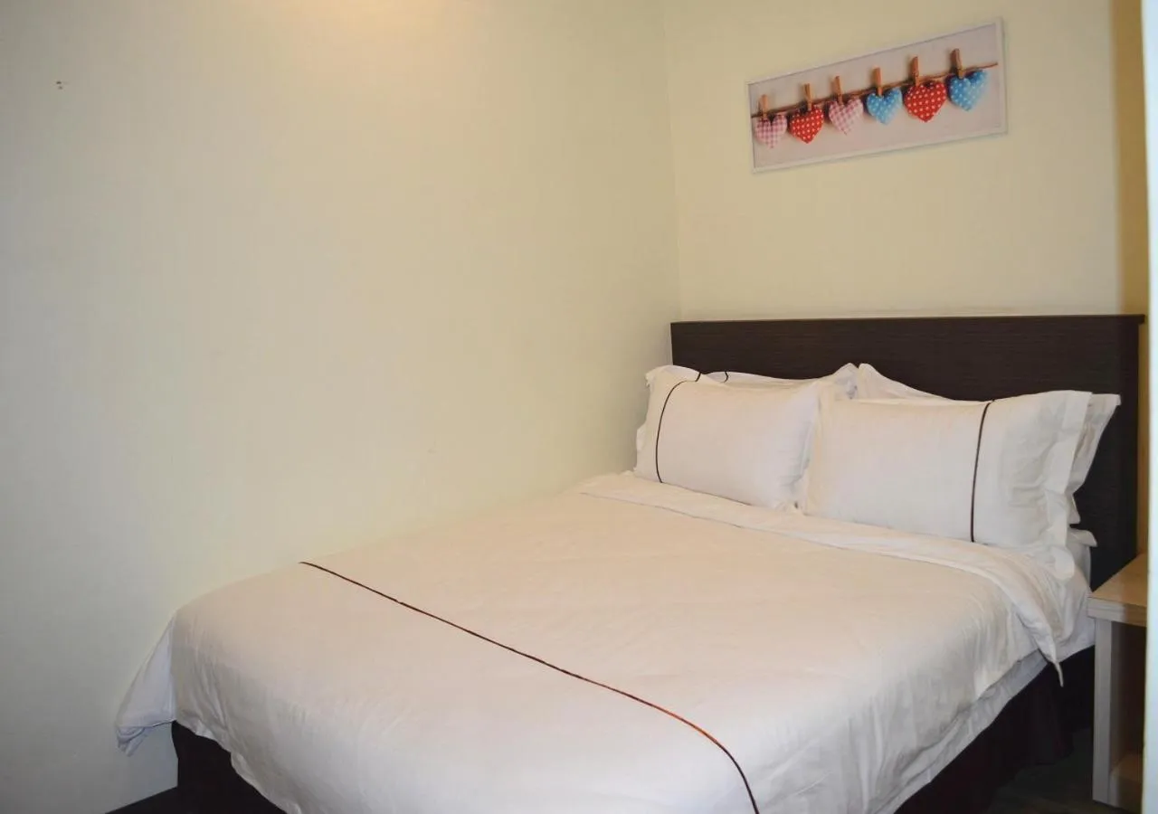 Bed in Angsoka Hotel