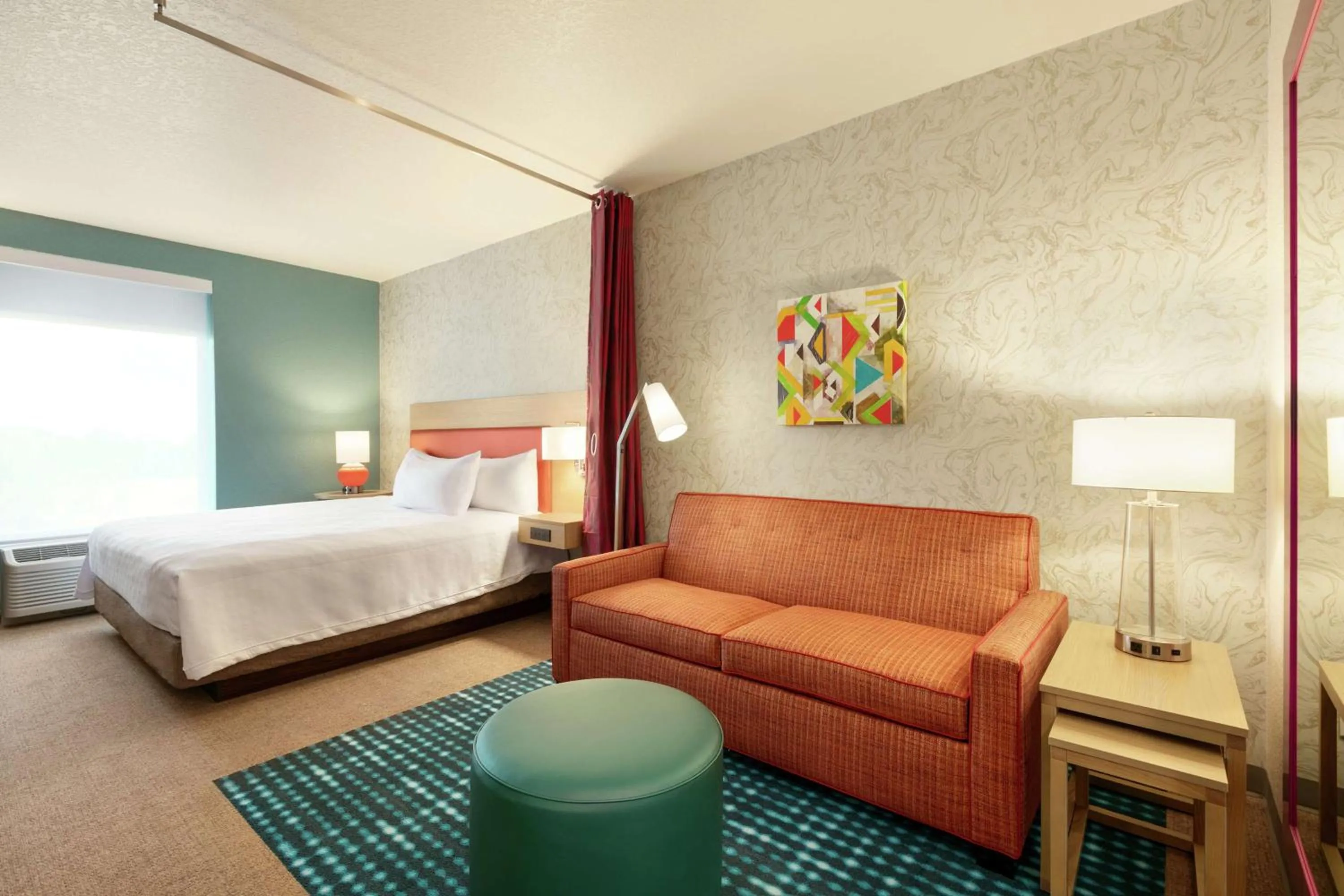 Living room, Bed in Home2 Suites By Hilton Brandon Tampa