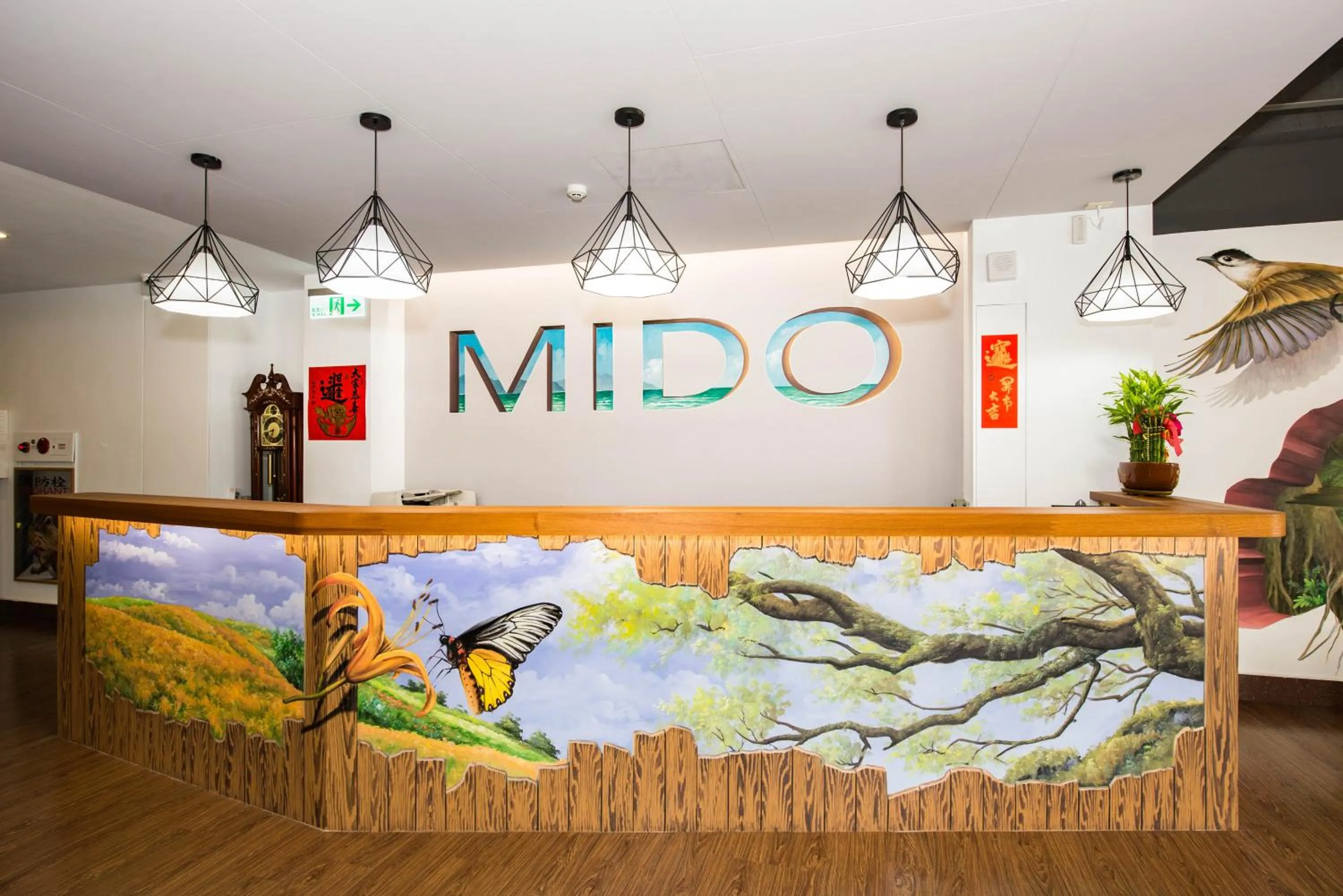 Property logo or sign in Traveller Inn - Mido Hotel