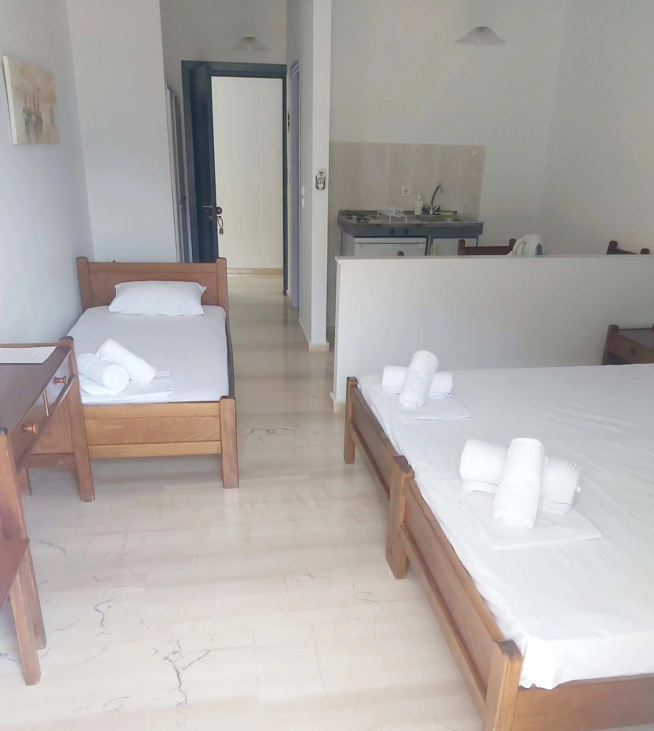 Bed in Filoxenia Hotel & Apartments