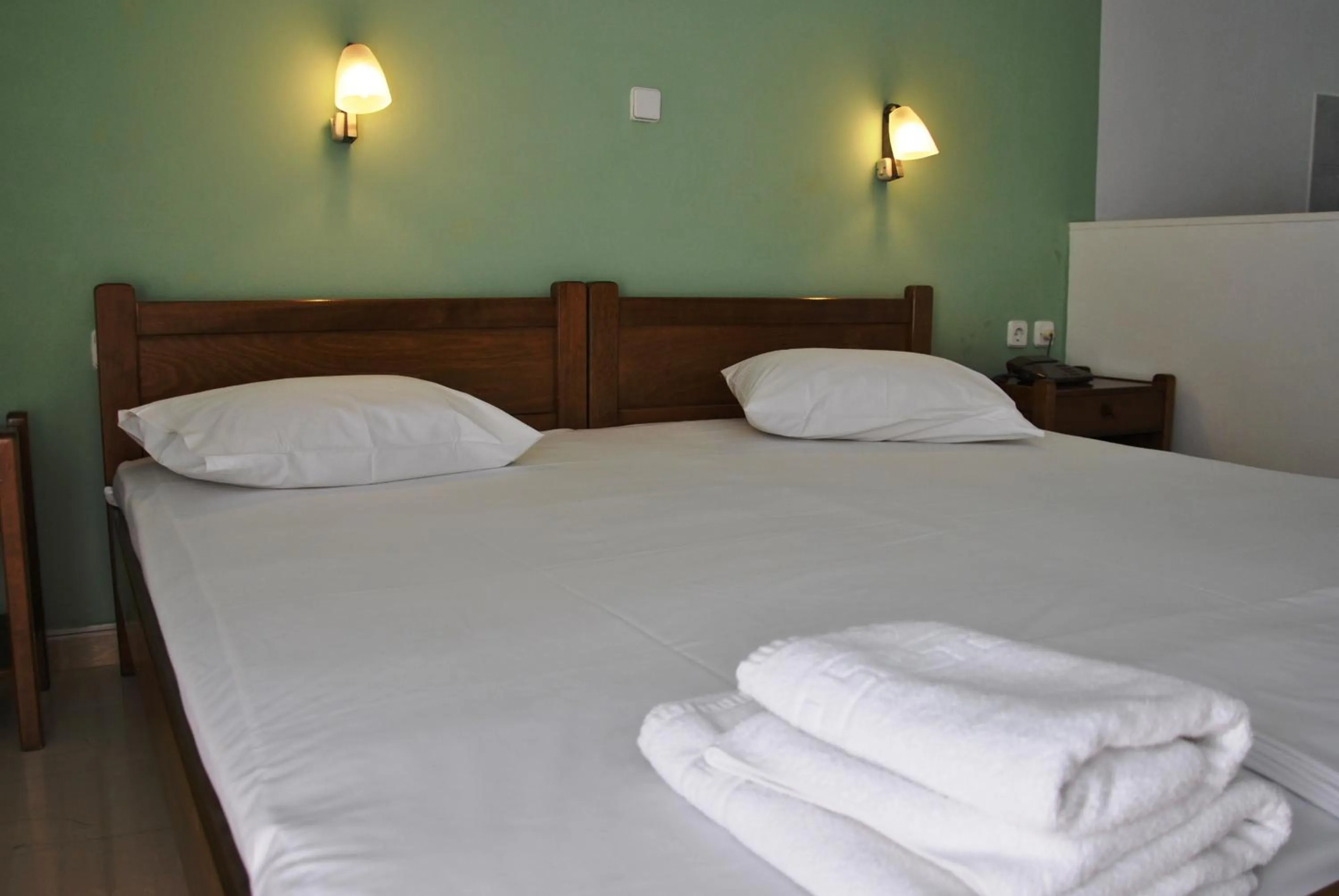 Bed in Filoxenia Hotel & Apartments