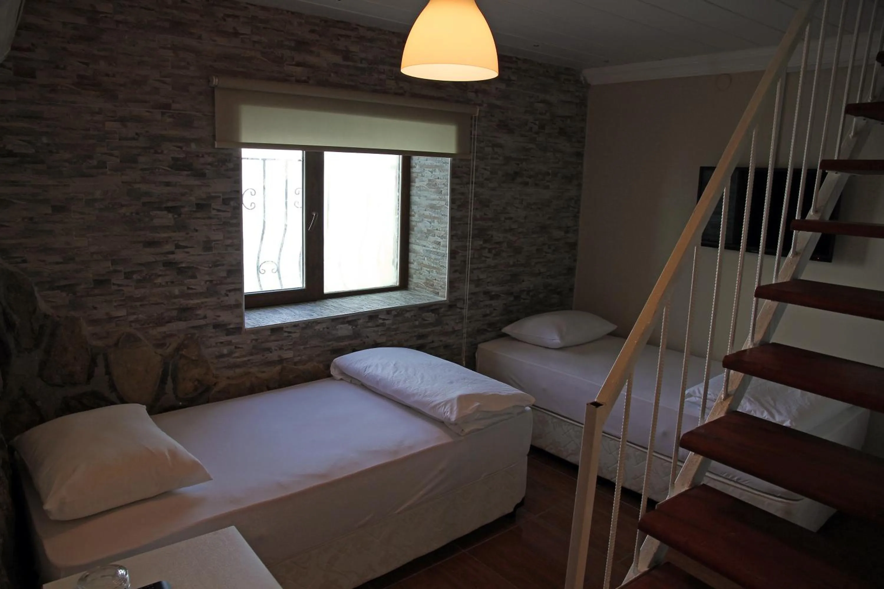 Photo of the whole room, Bed in Aqua Boss Hotel