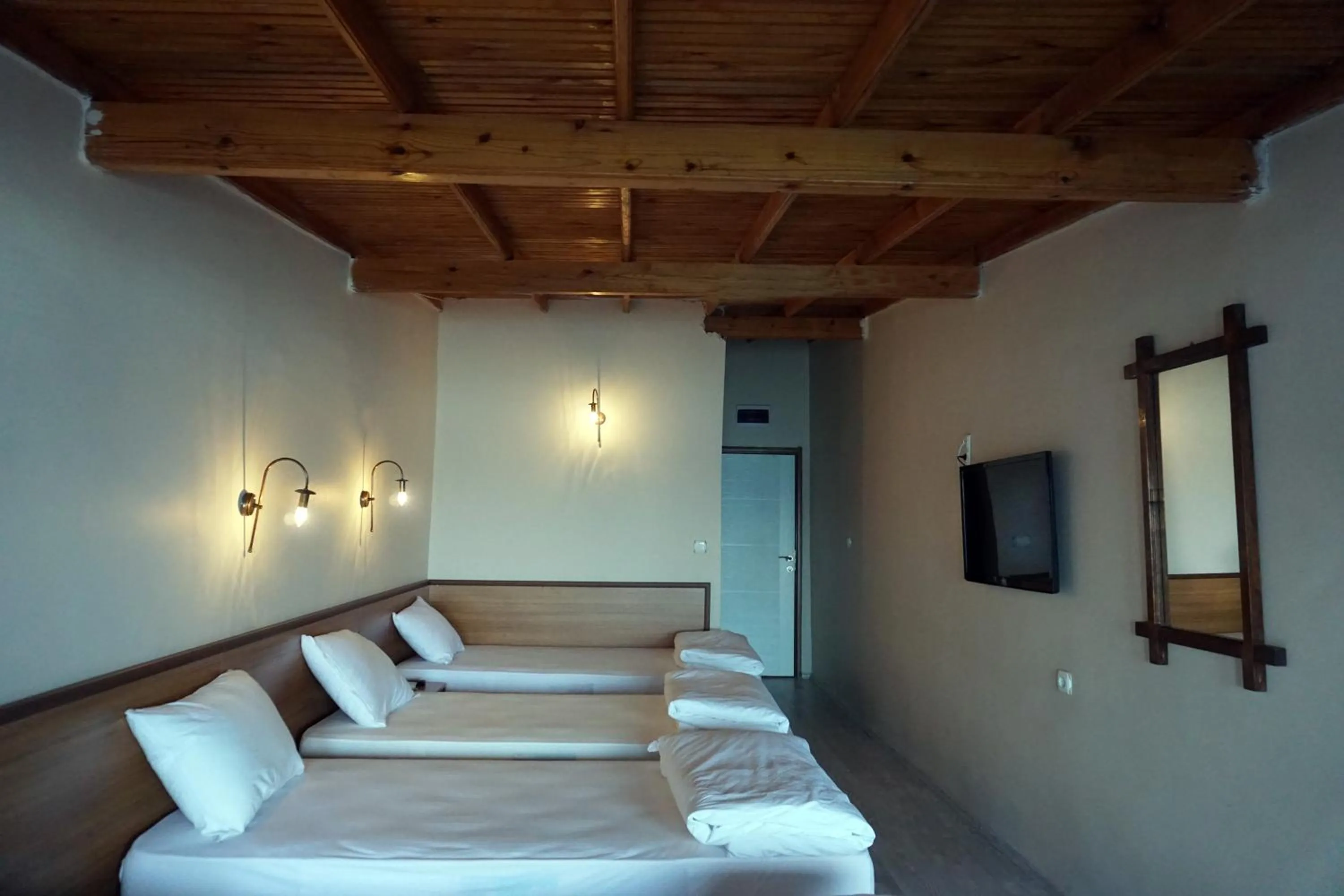 Patio, Bed in Aqua Boss Hotel