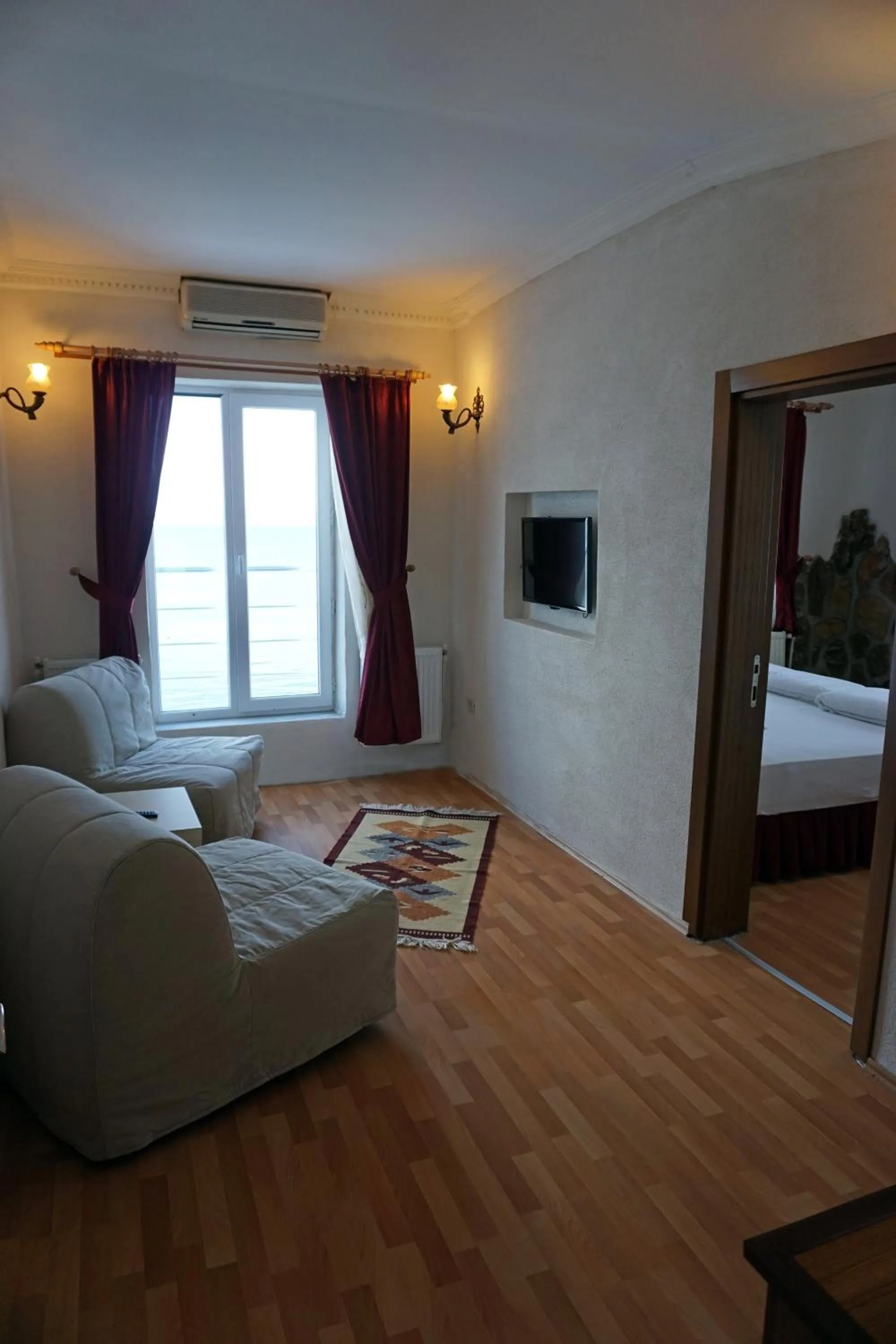 Toilet, Bed in Aqua Boss Hotel