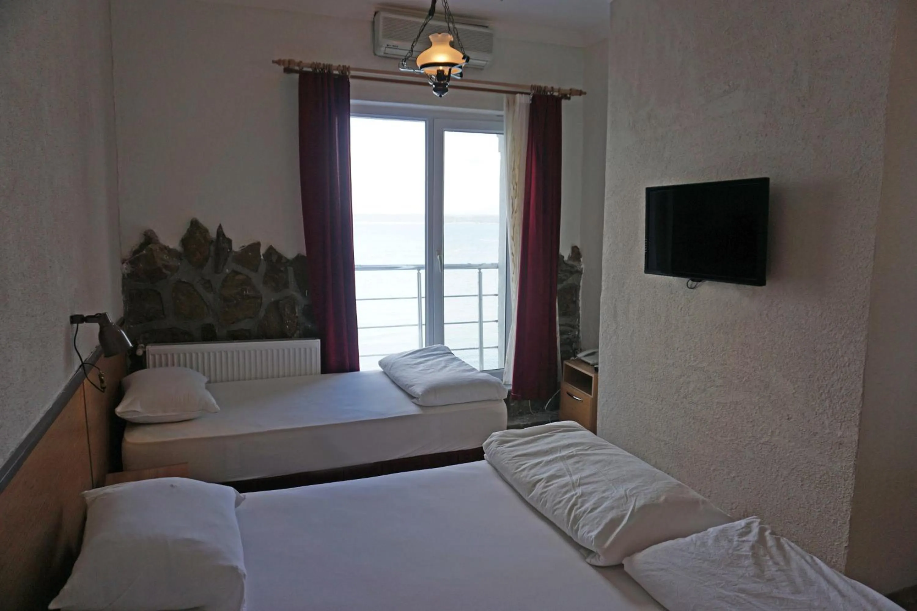 Living room, Bed in Aqua Boss Hotel