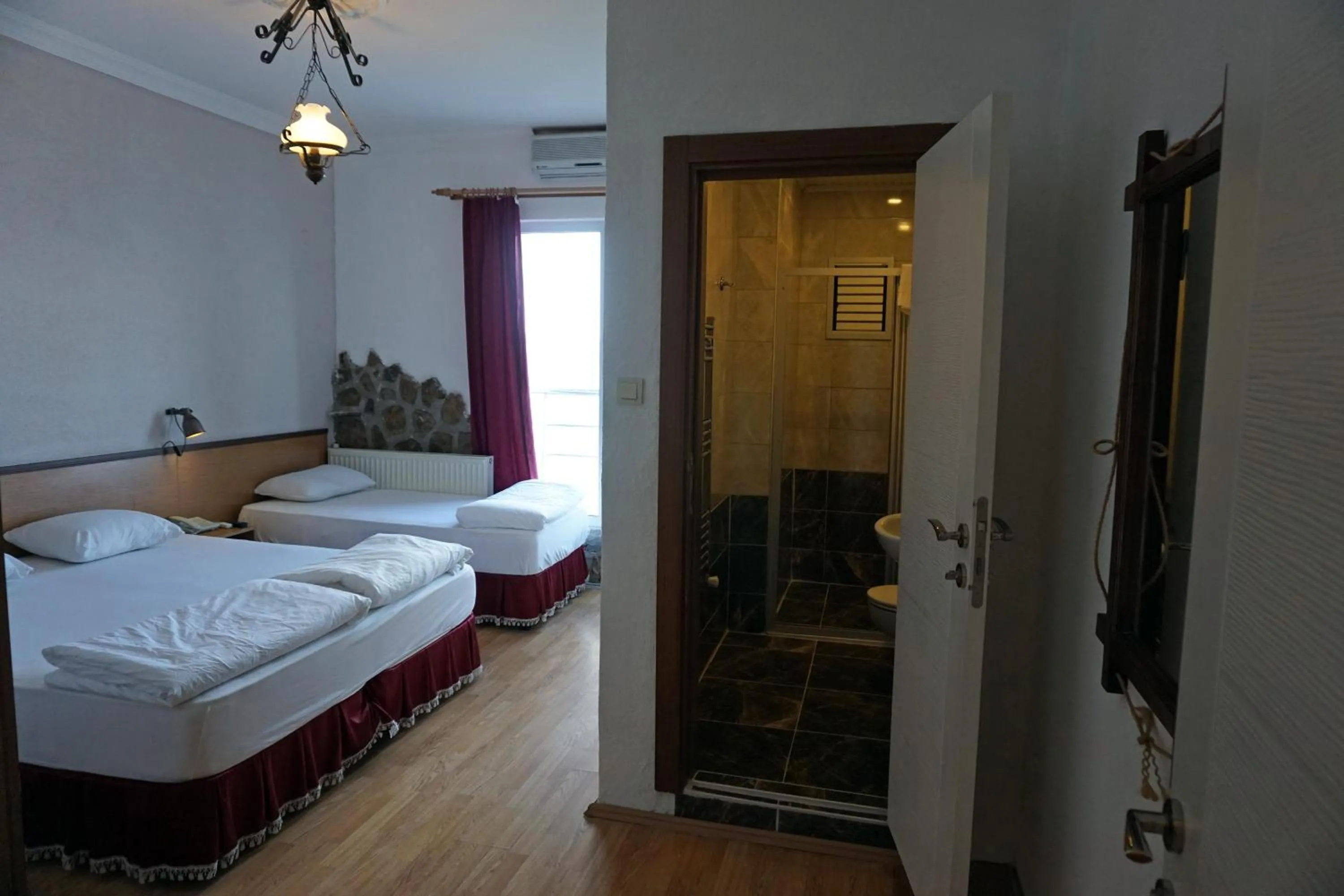 Shower, Bed in Aqua Boss Hotel