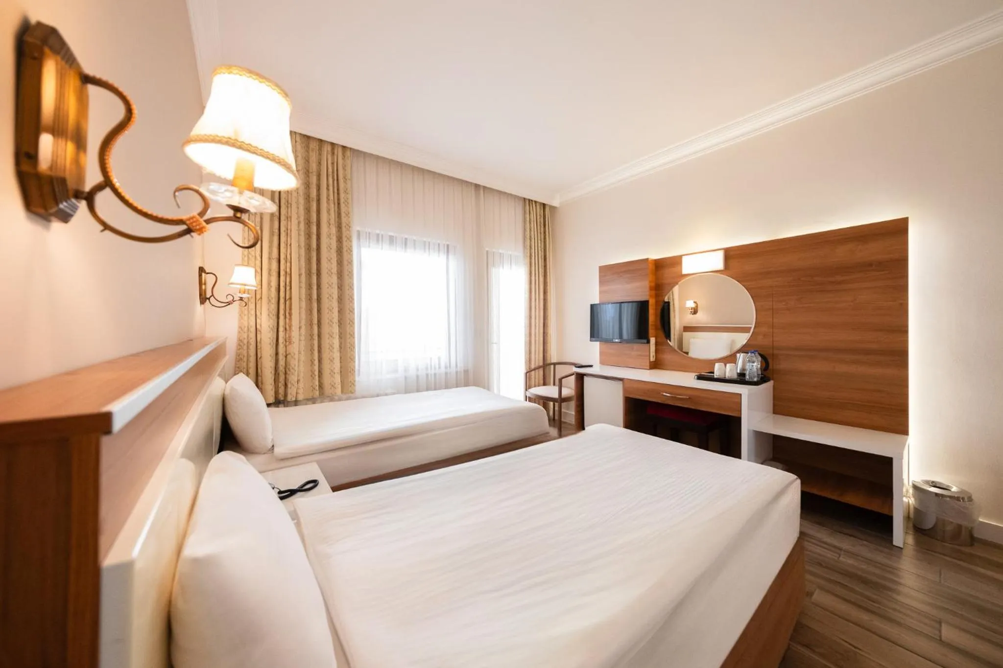 Bed in Iris Hotel & Spa