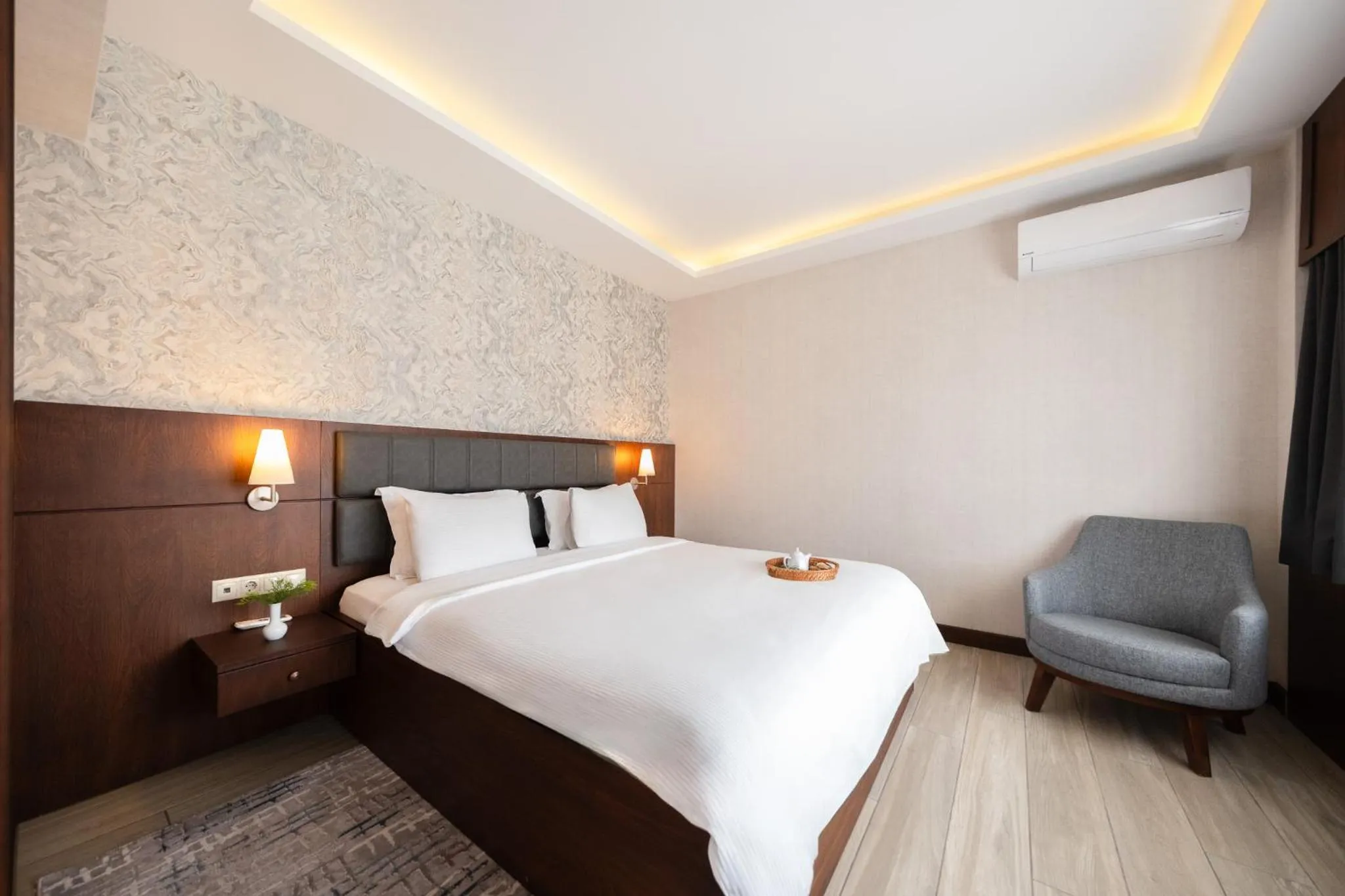 Bed in Iris Hotel & Spa