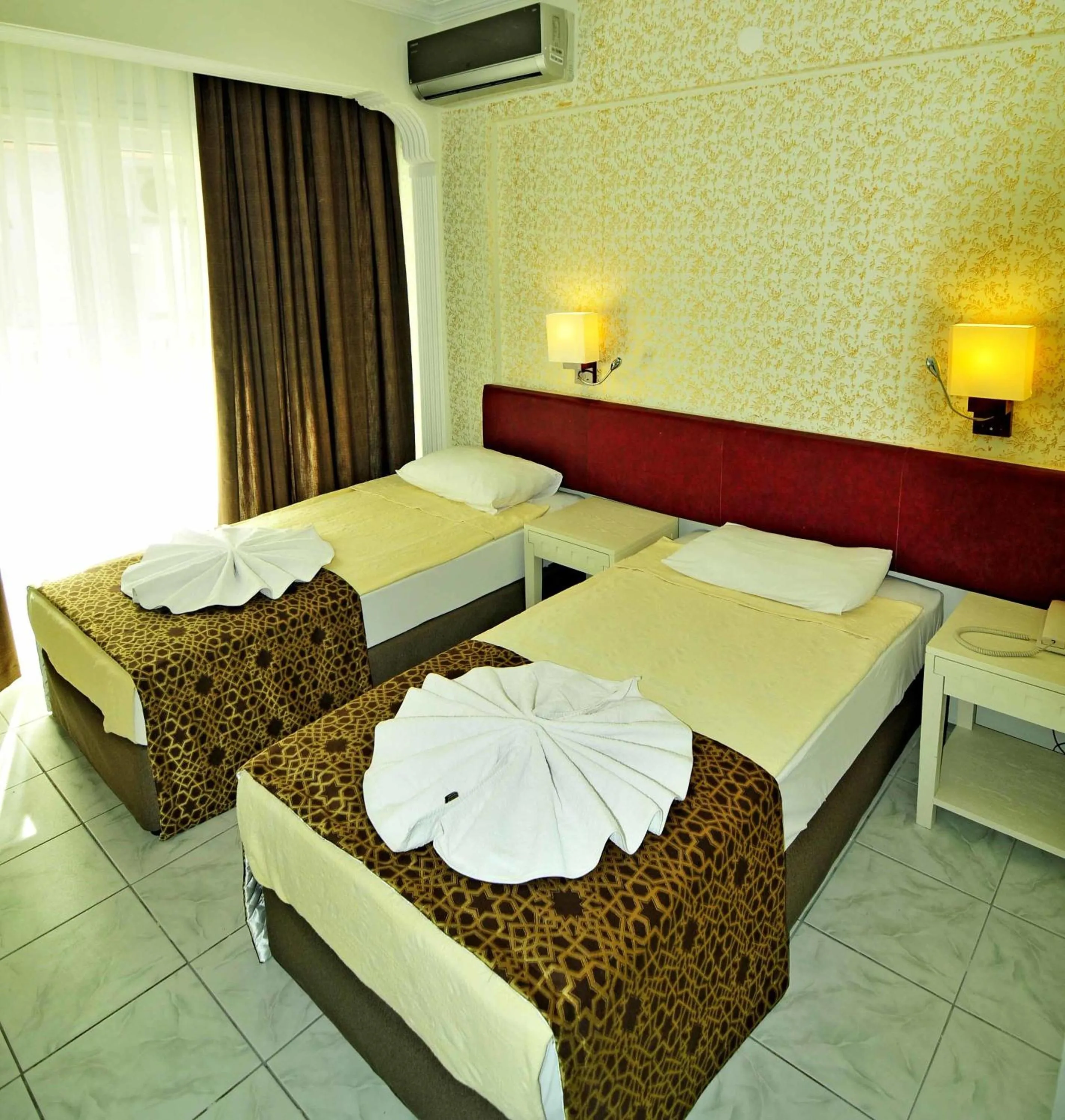 Bed in Sun Kiss Hotel