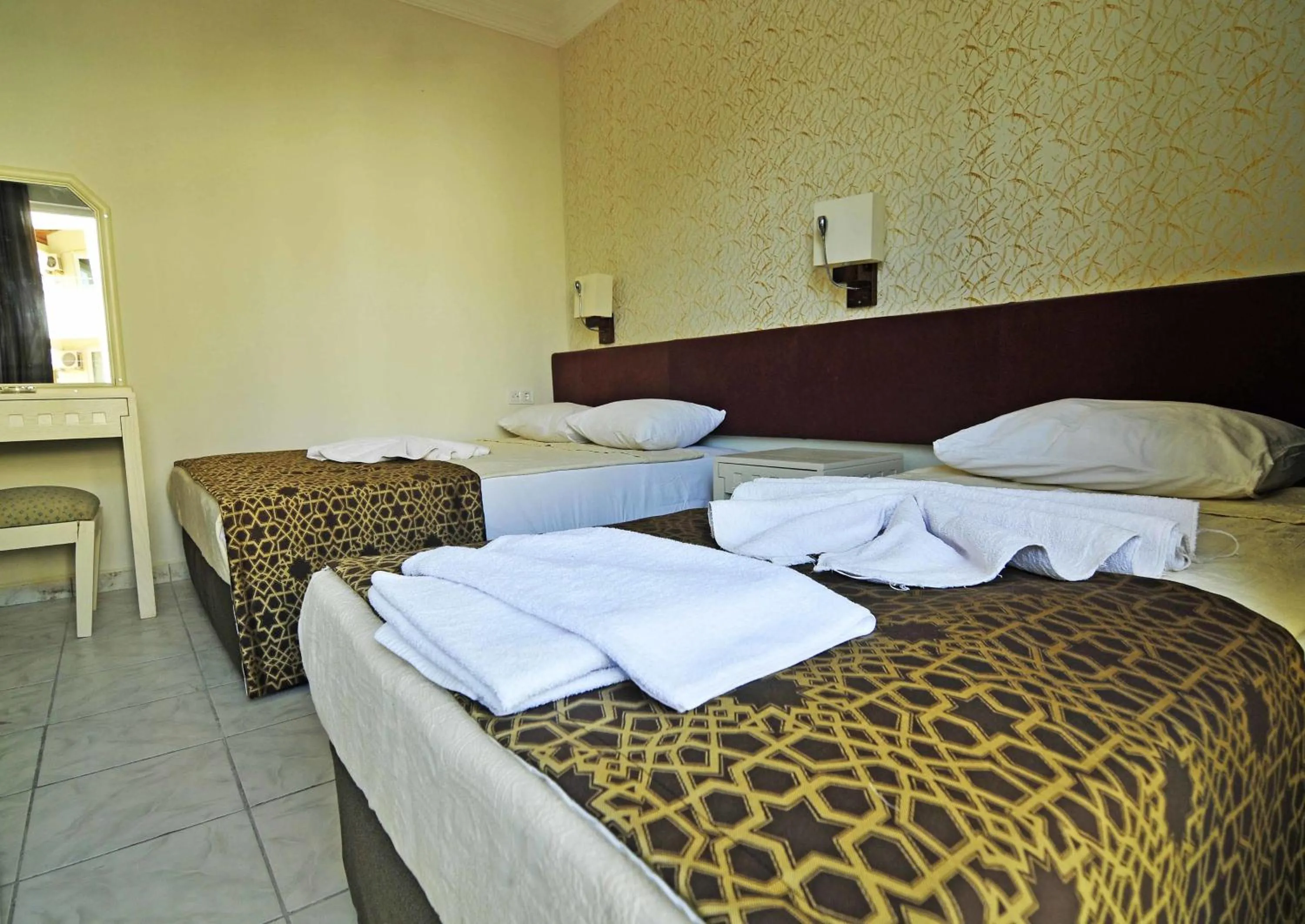 Bed in Sun Kiss Hotel