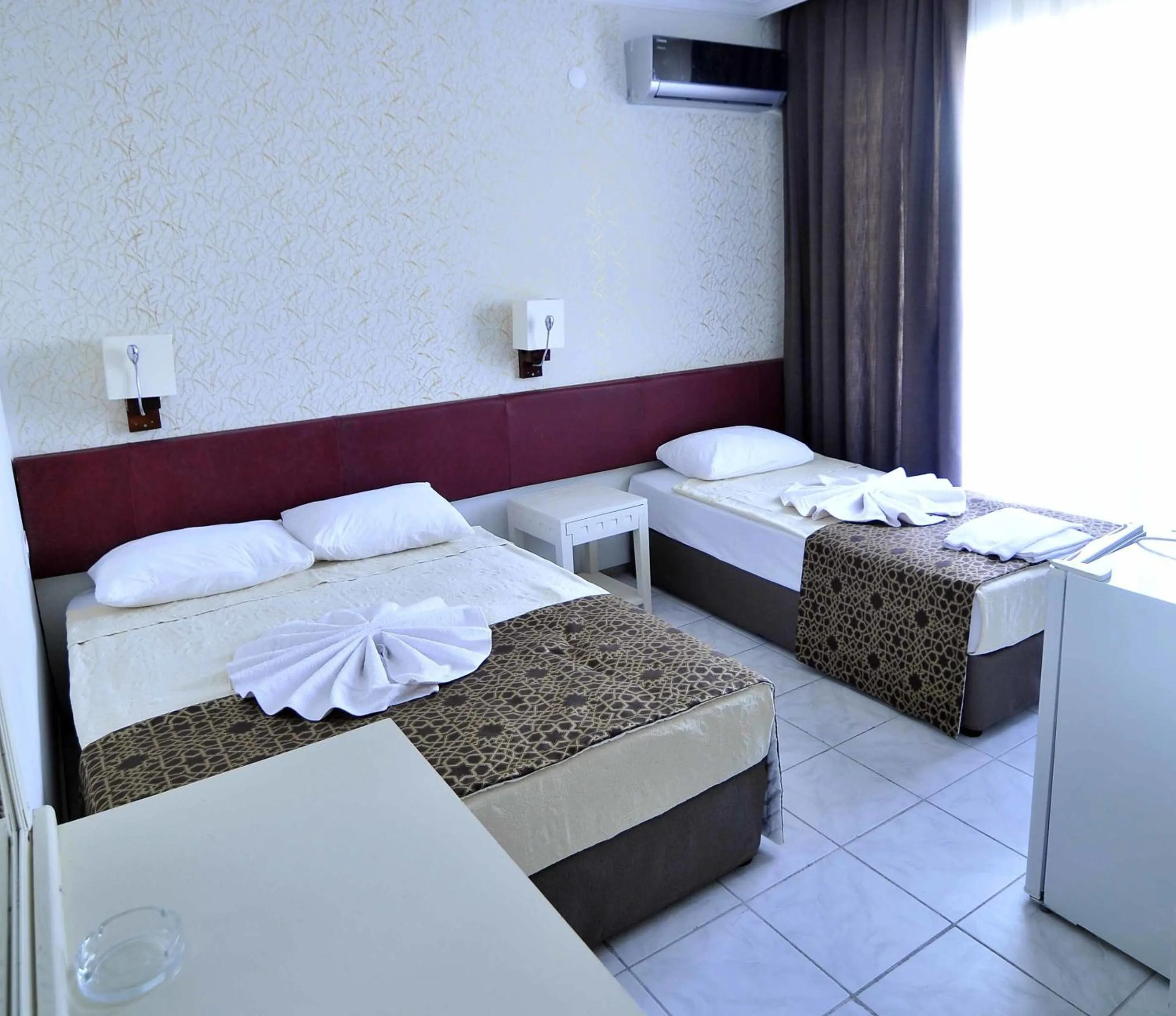 Bed in Sun Kiss Hotel