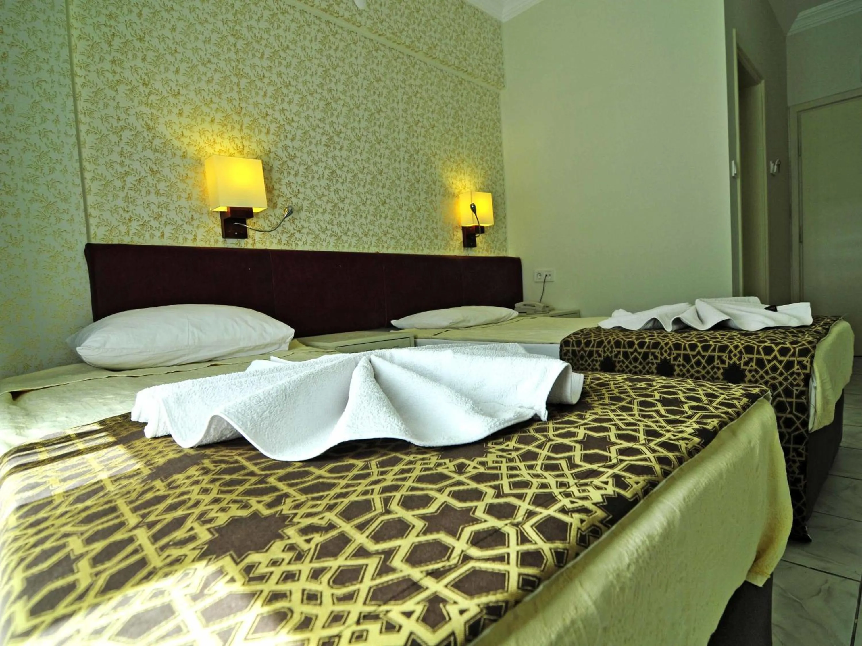 Bed in Sun Kiss Hotel