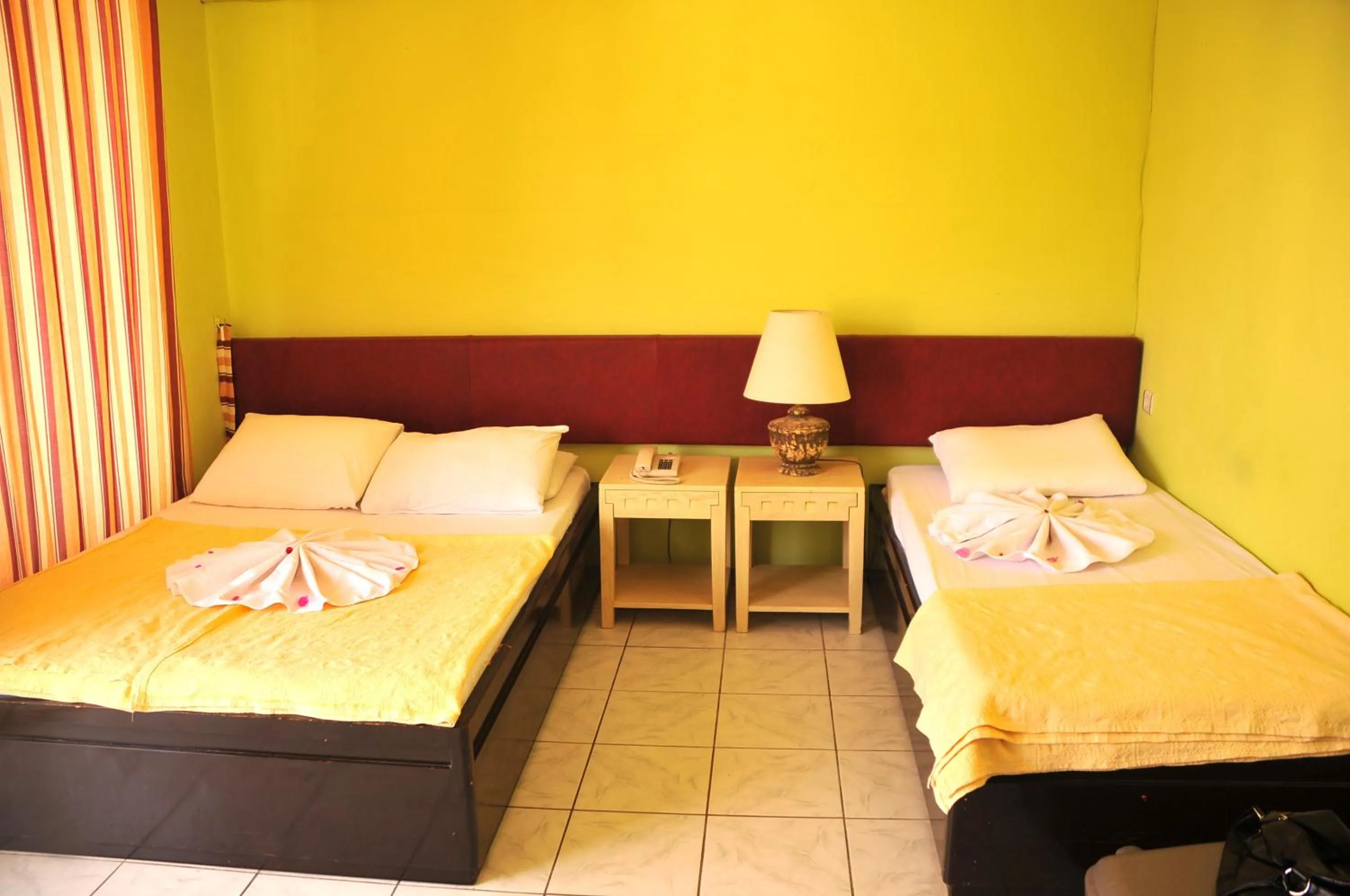 Bed in Sun Kiss Hotel